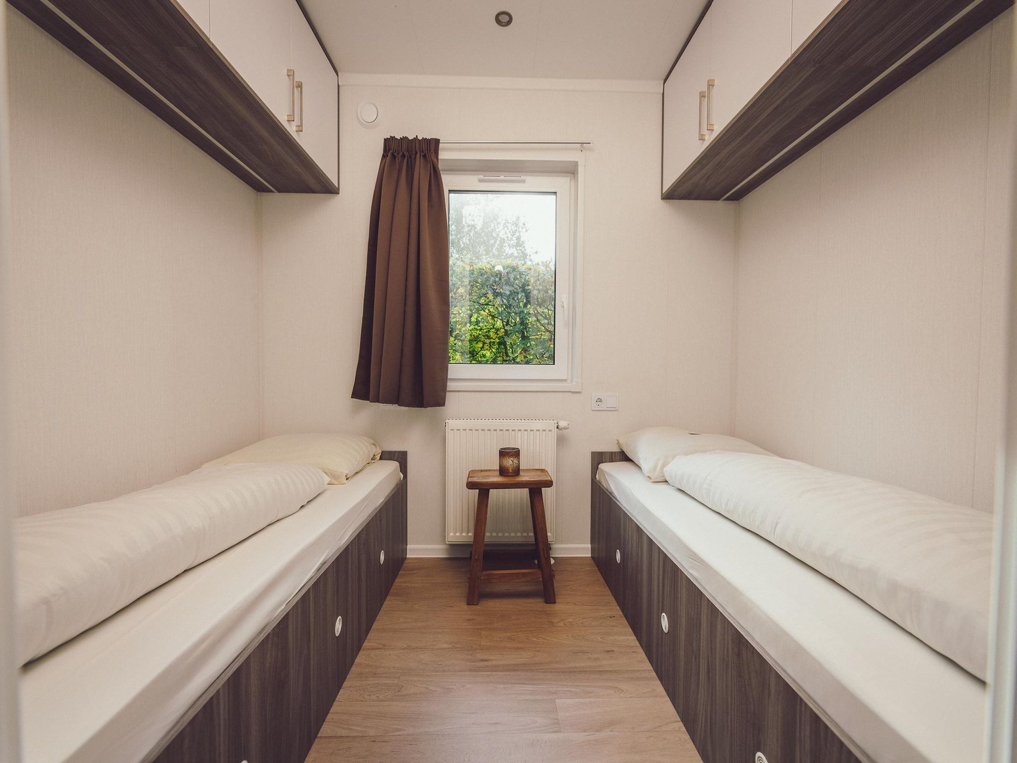 Een slaapkamer van Tiny Cabin with Hottub I 4 people in Rijssen