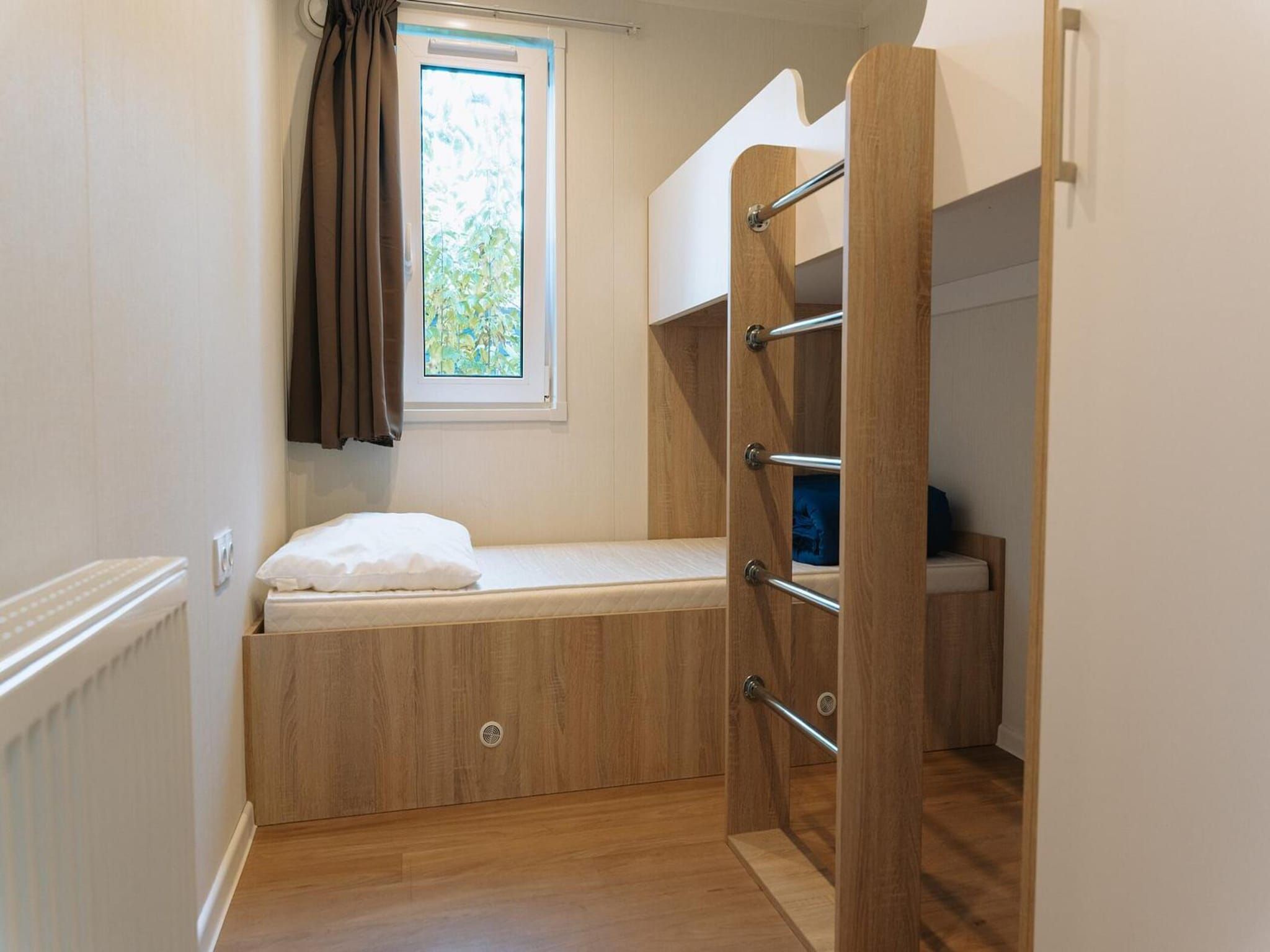 Een slaapkamer van Tiny Cabin with Hottub I 4 people in Rijssen