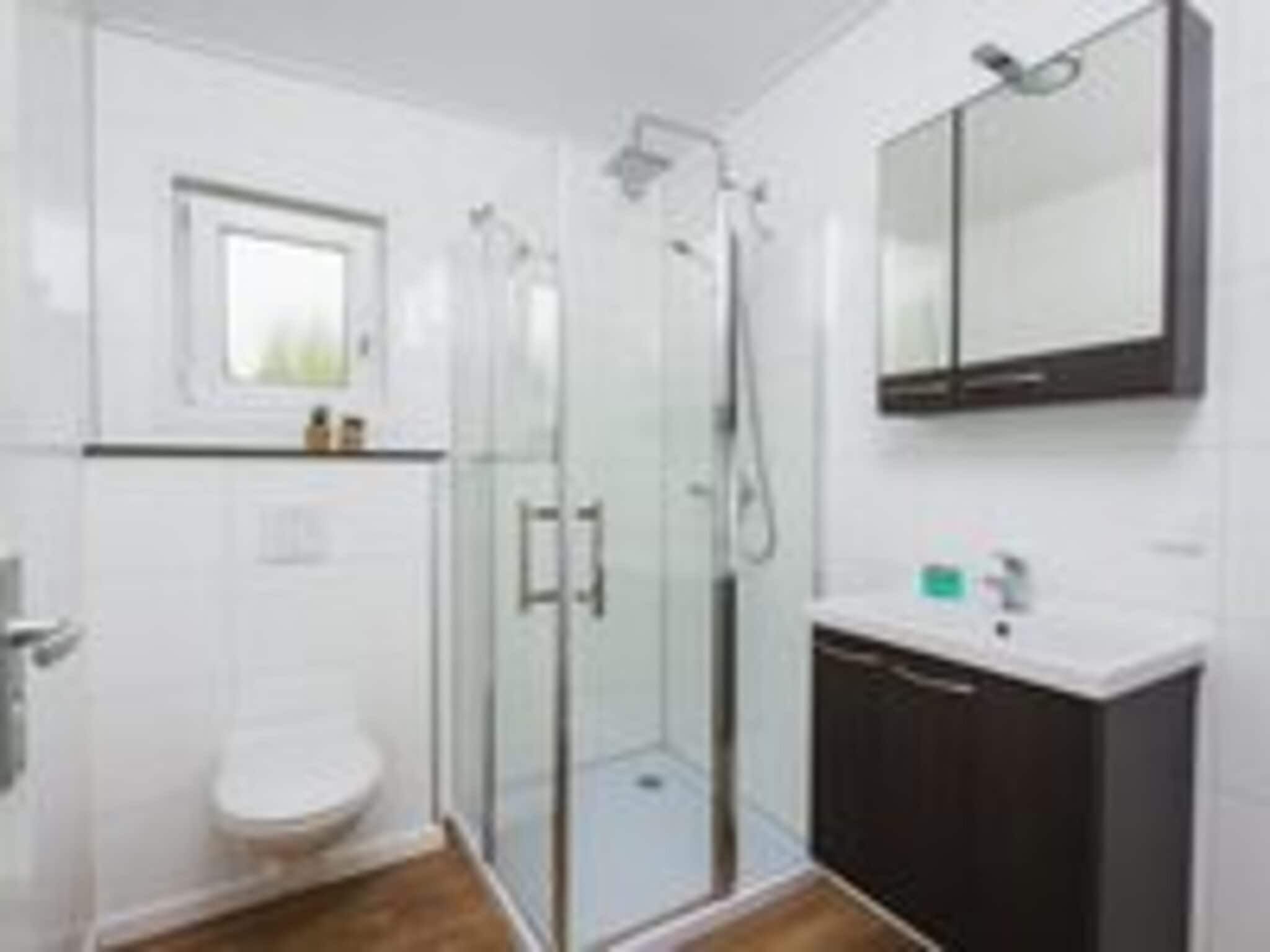 De badkamer van Luxury lodge with private sauna | 6 people in Rijssen