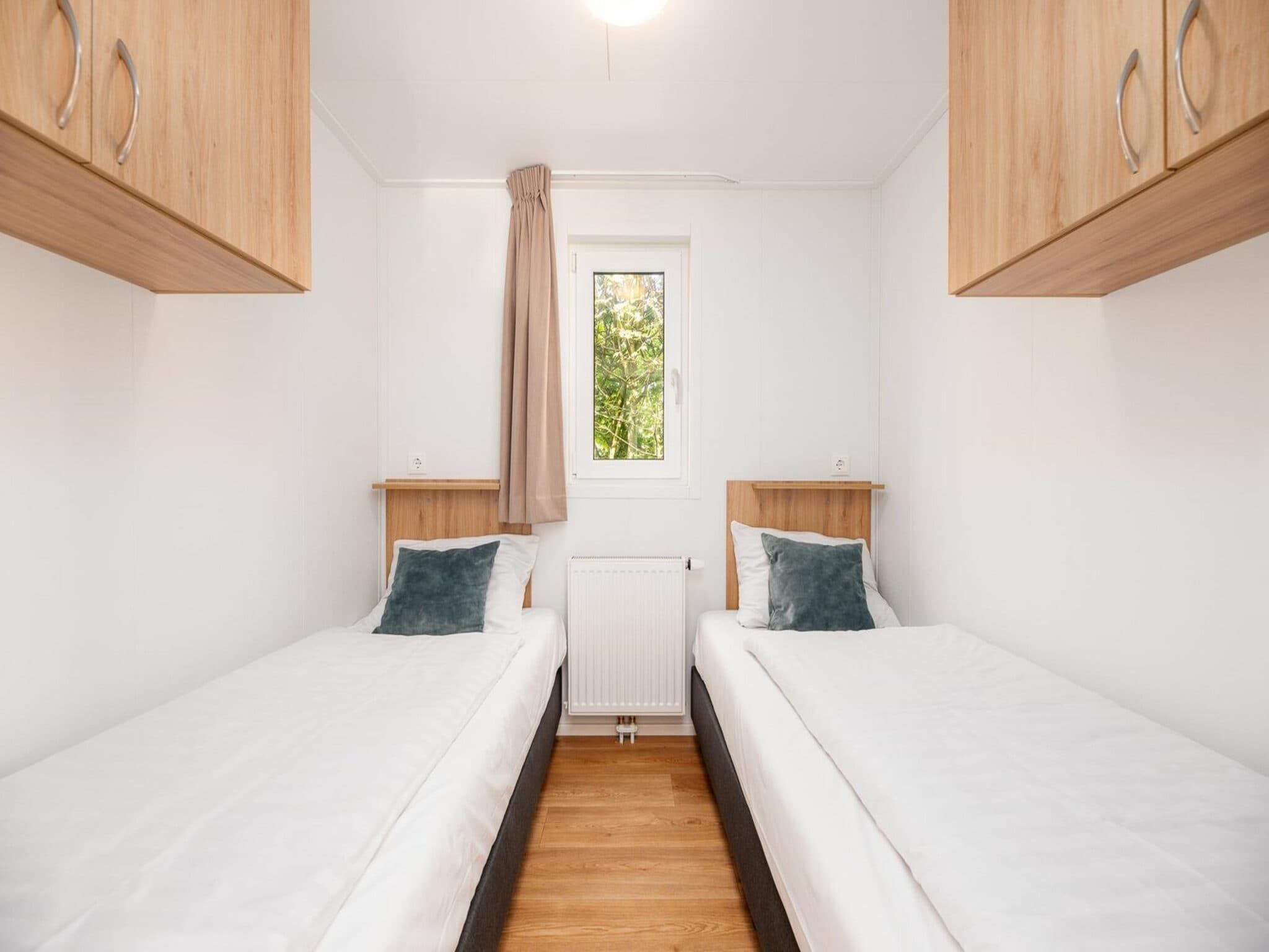 Een slaapkamer van River Cabin with hot tub | 6 people in Zuna