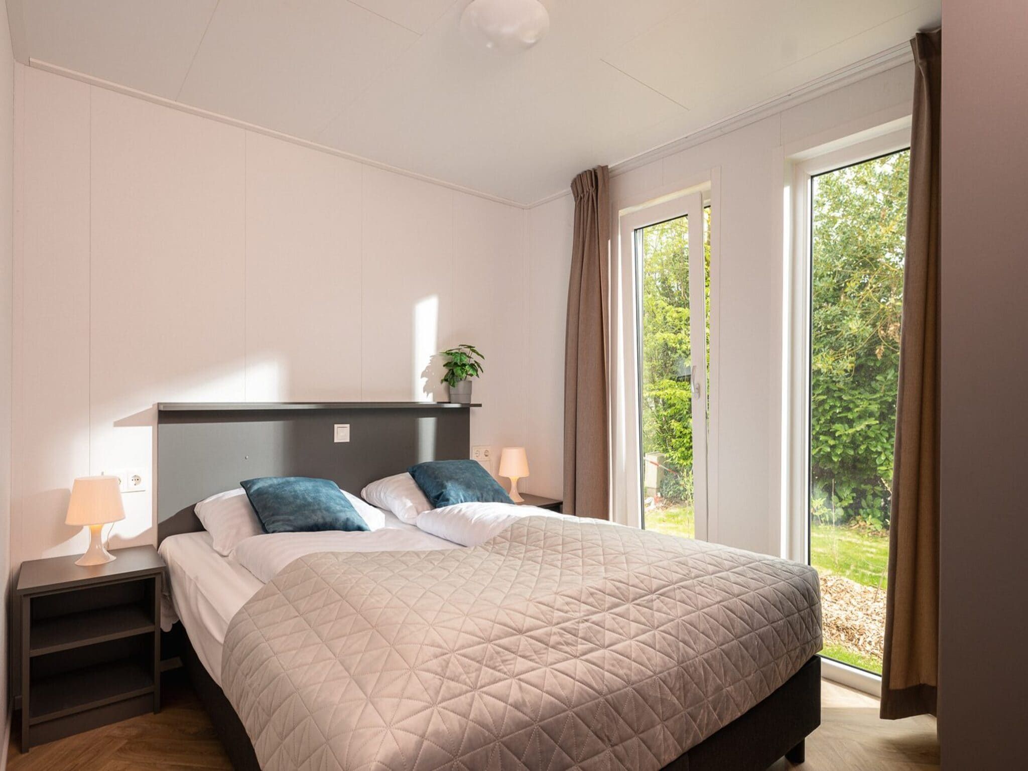 Een slaapkamer van Wellness Boutique | 5 people in Zuna