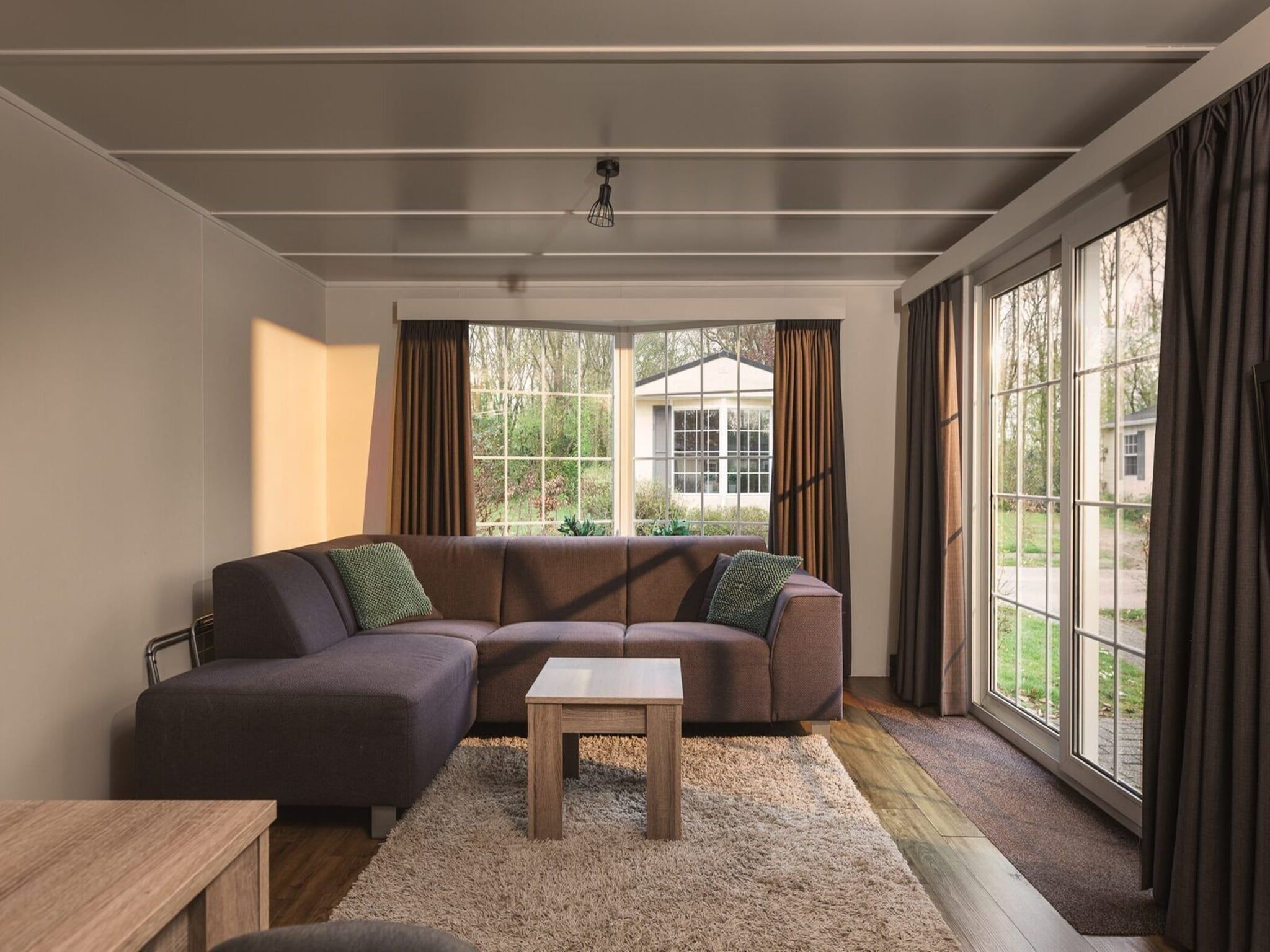 De woonkamer van Bungalette basic with hot tub I 4 people in Zuna