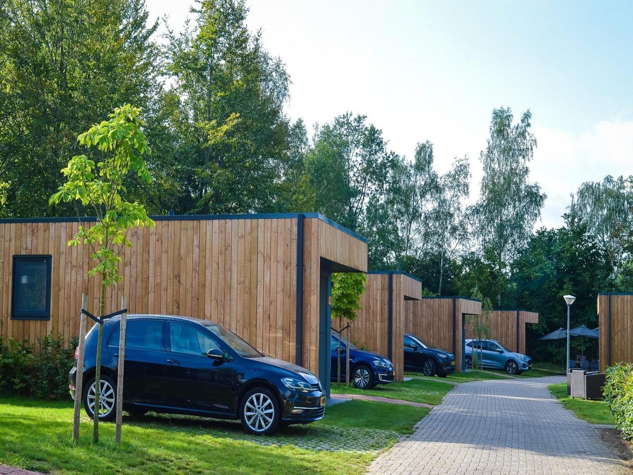 De buitenkant van Group accommodation (7x Happy Oak Lodge 28p) in Zuna