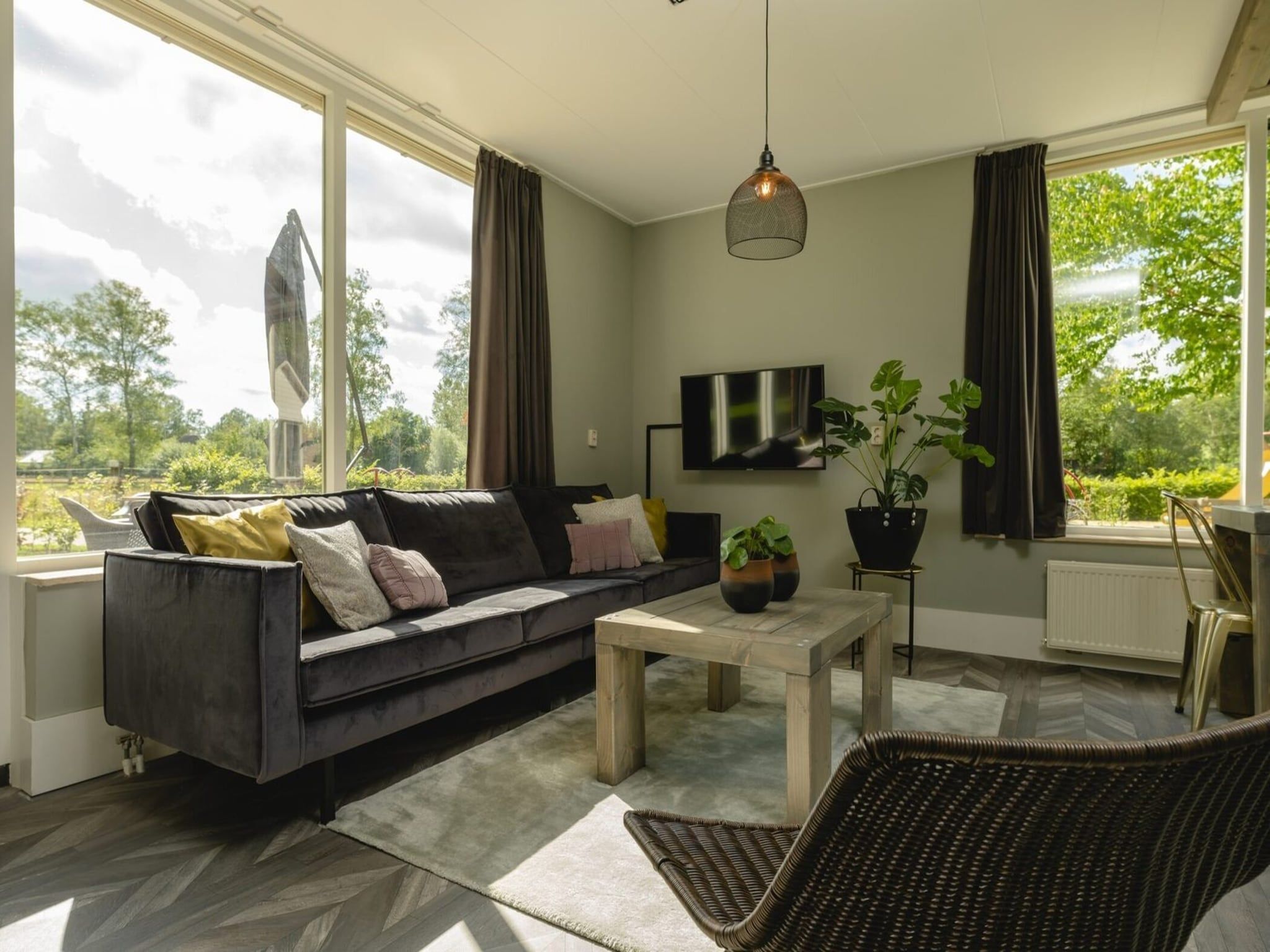 De woonkamer van Baby & children's bungalow 'Knights & Princesses' with sauna & bubble bath I sleep 5 in Zuna