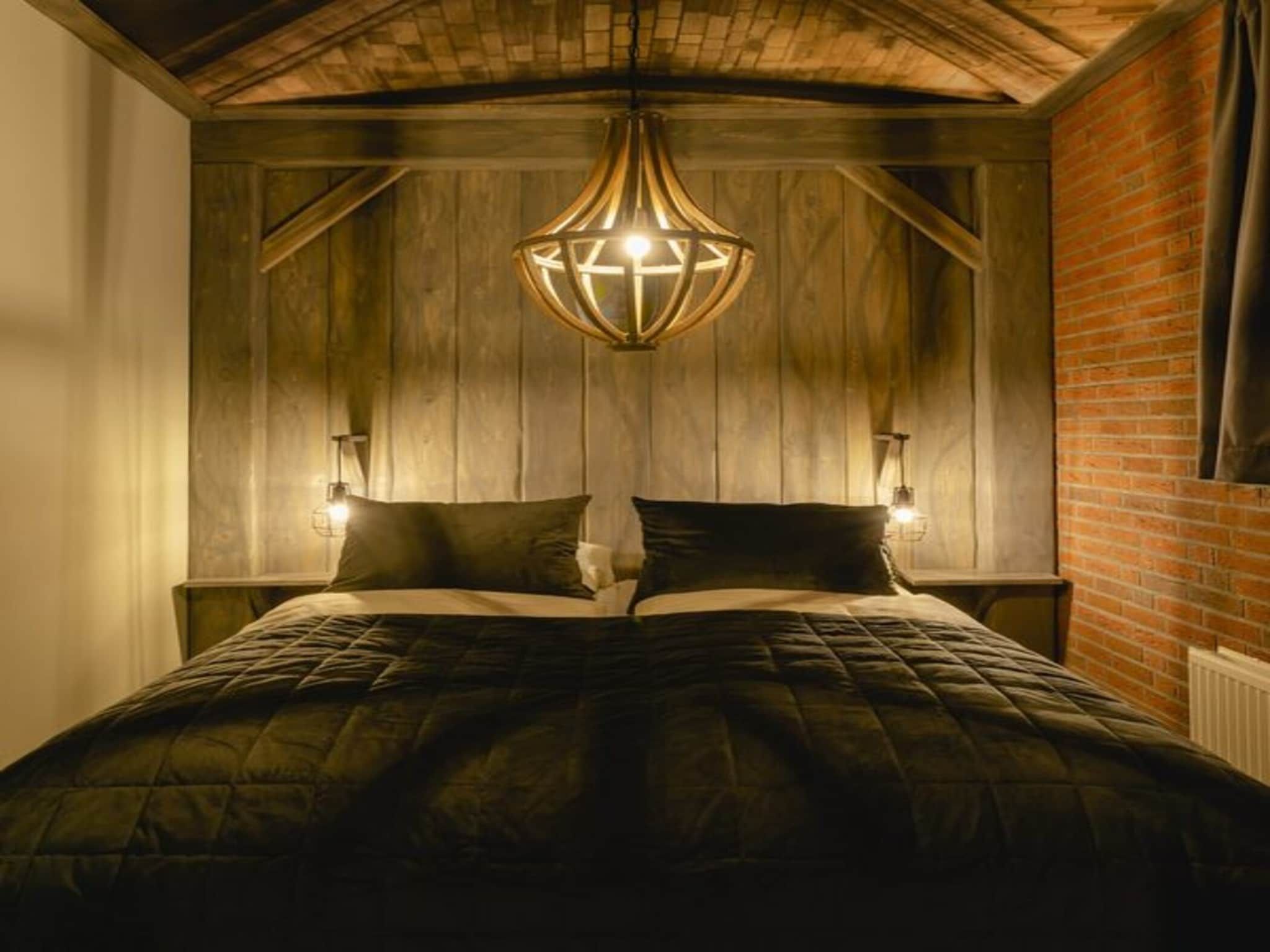 Een slaapkamer van Baby & children's bungalow 'Knights & Princesses' with sauna & bubble bath I sleep 5 in Zuna