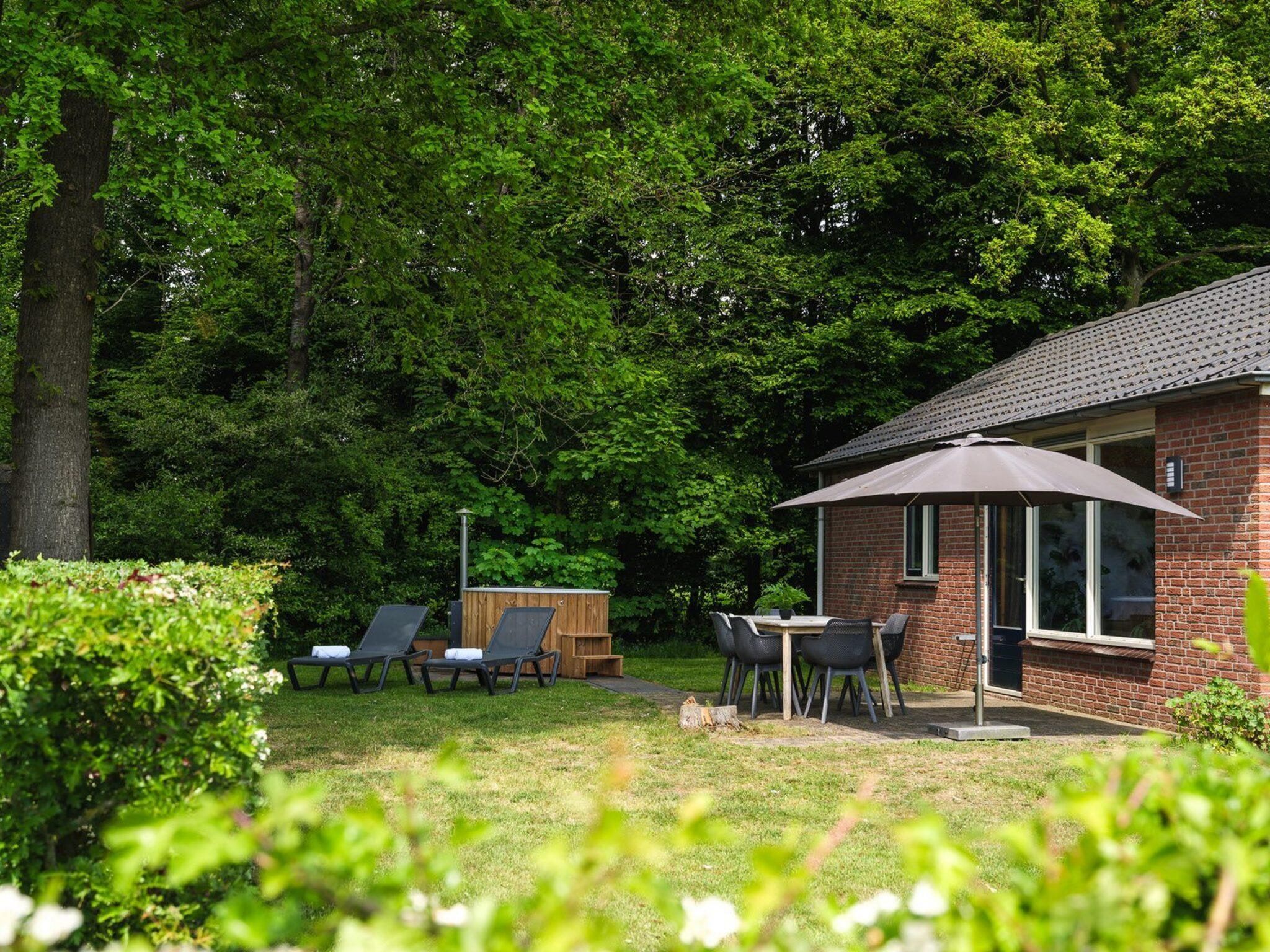 Het terras van Baby & children bungalow with bubble tub I 5 persons in Zuna