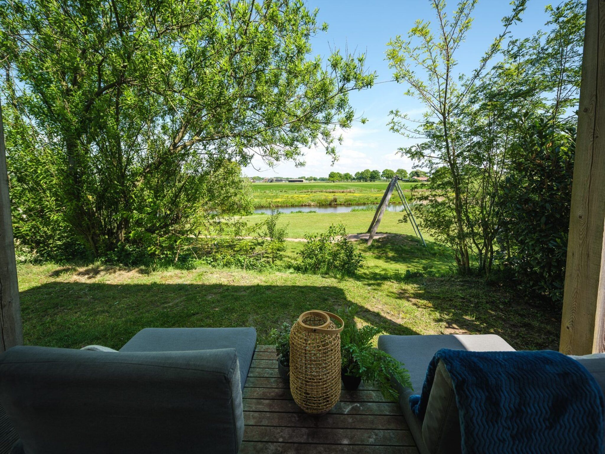 Het uitzicht vanaf River Lodge 'Wellnesshuus' with whirlpool, sauna, bathtub, and sun shower | 2 people in Zuna