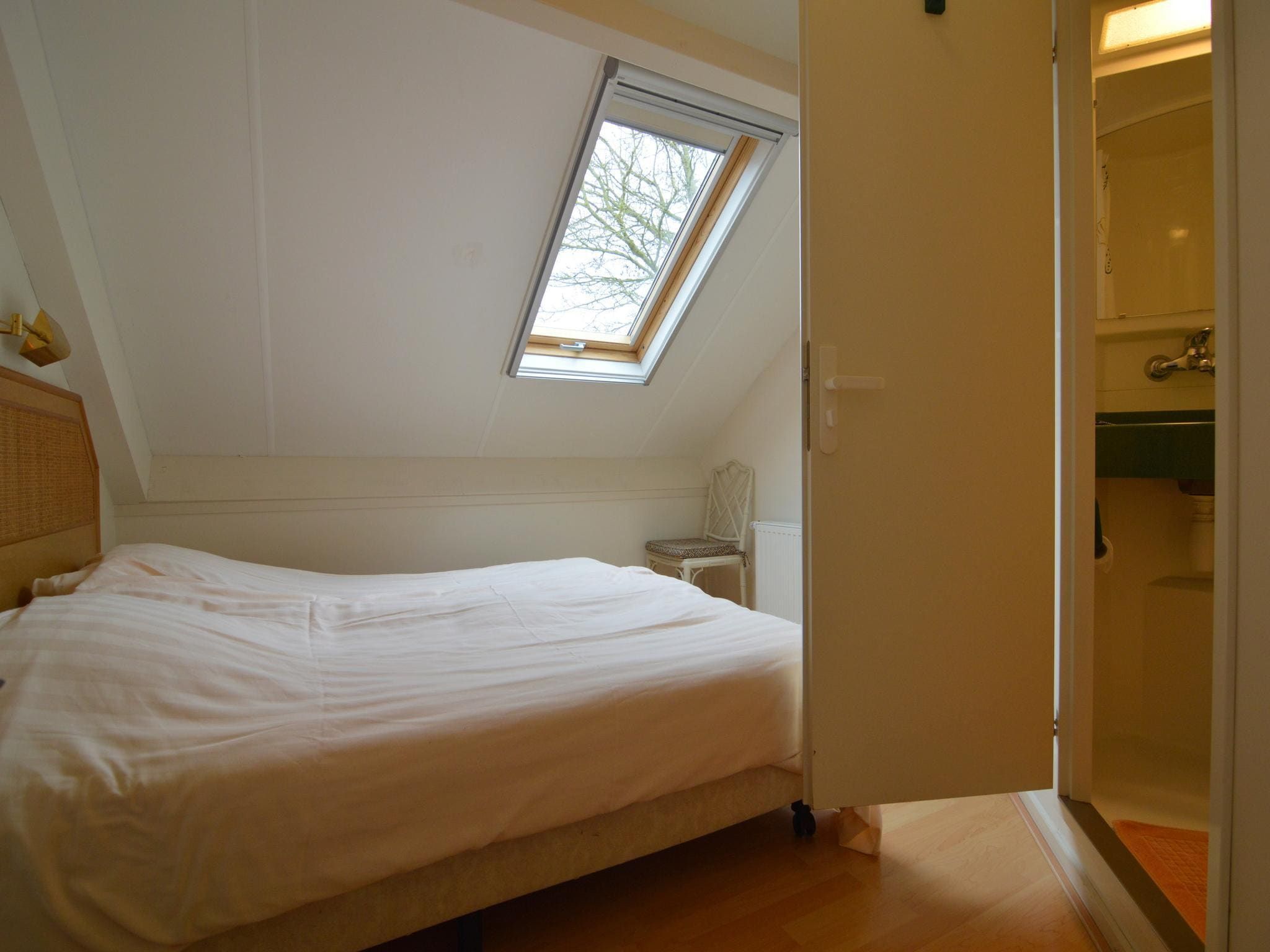 Een slaapkamer van BELLEVUE in Noordbeemster