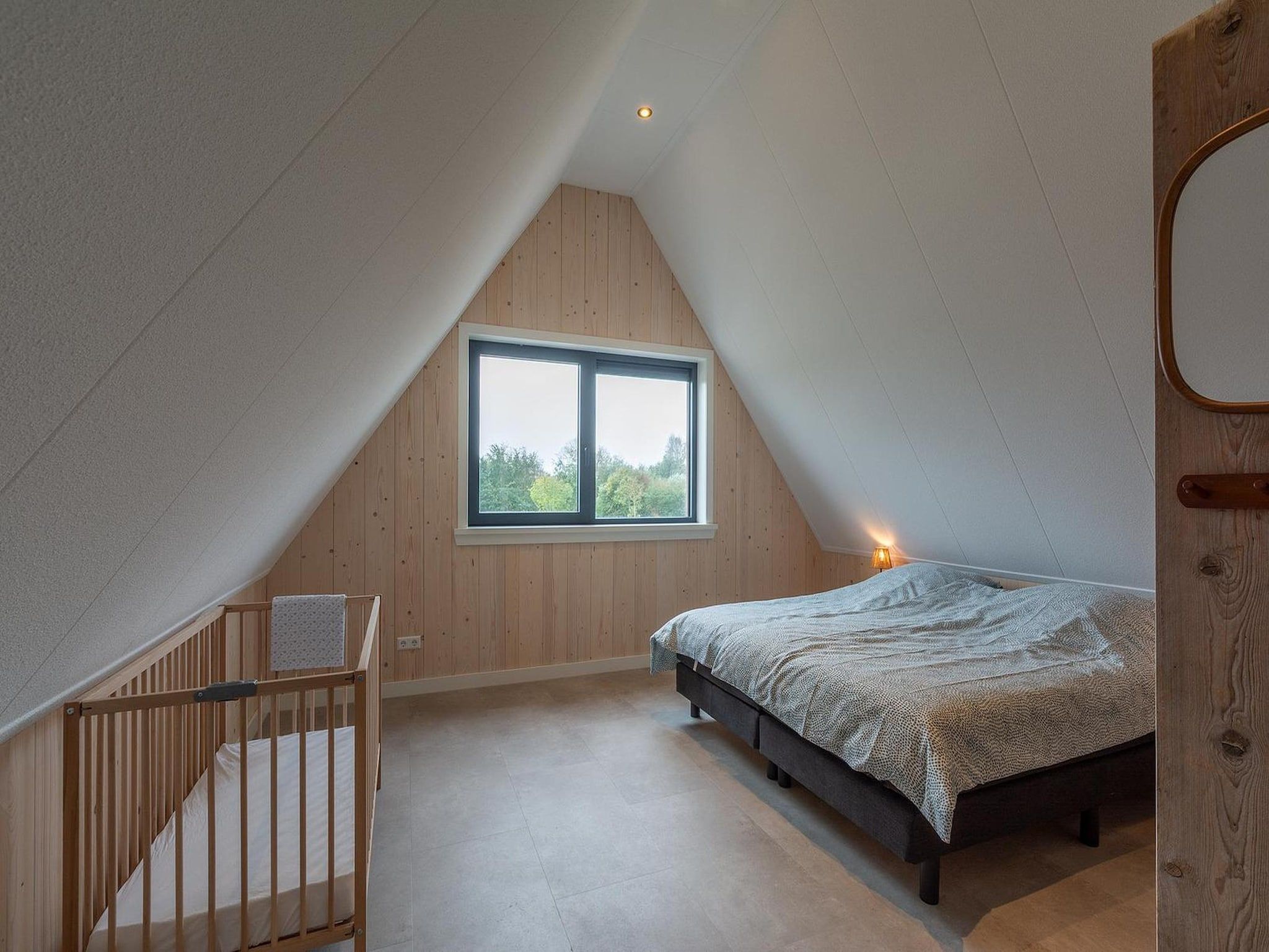 Een slaapkamer van Sandepark 113 in Groote Keeten