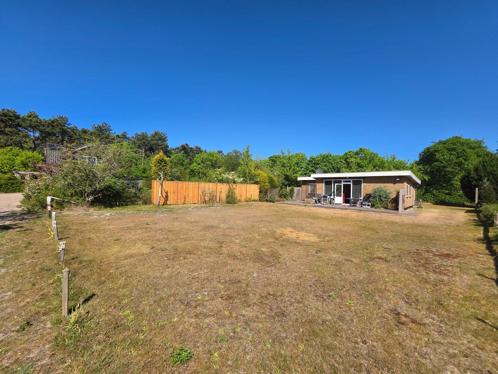 De tuin van Pelikaanweg 47 - Moha in De Koog