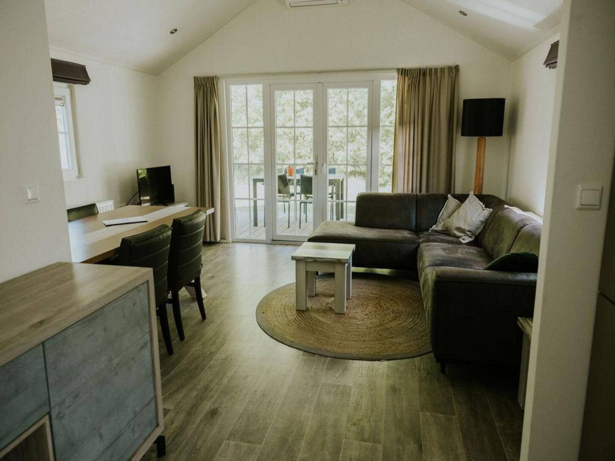 De woonkamer van Boslodge l 4 persons in Balkbrug