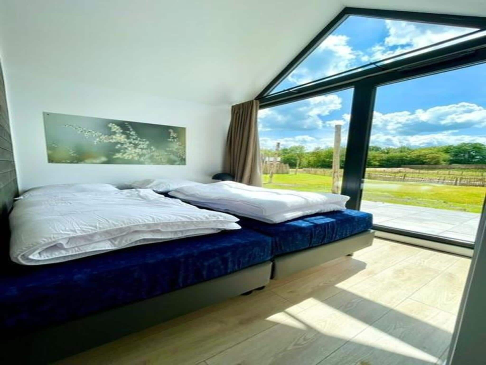 Een slaapkamer van Cosy house | 4 persoons in Balkbrug