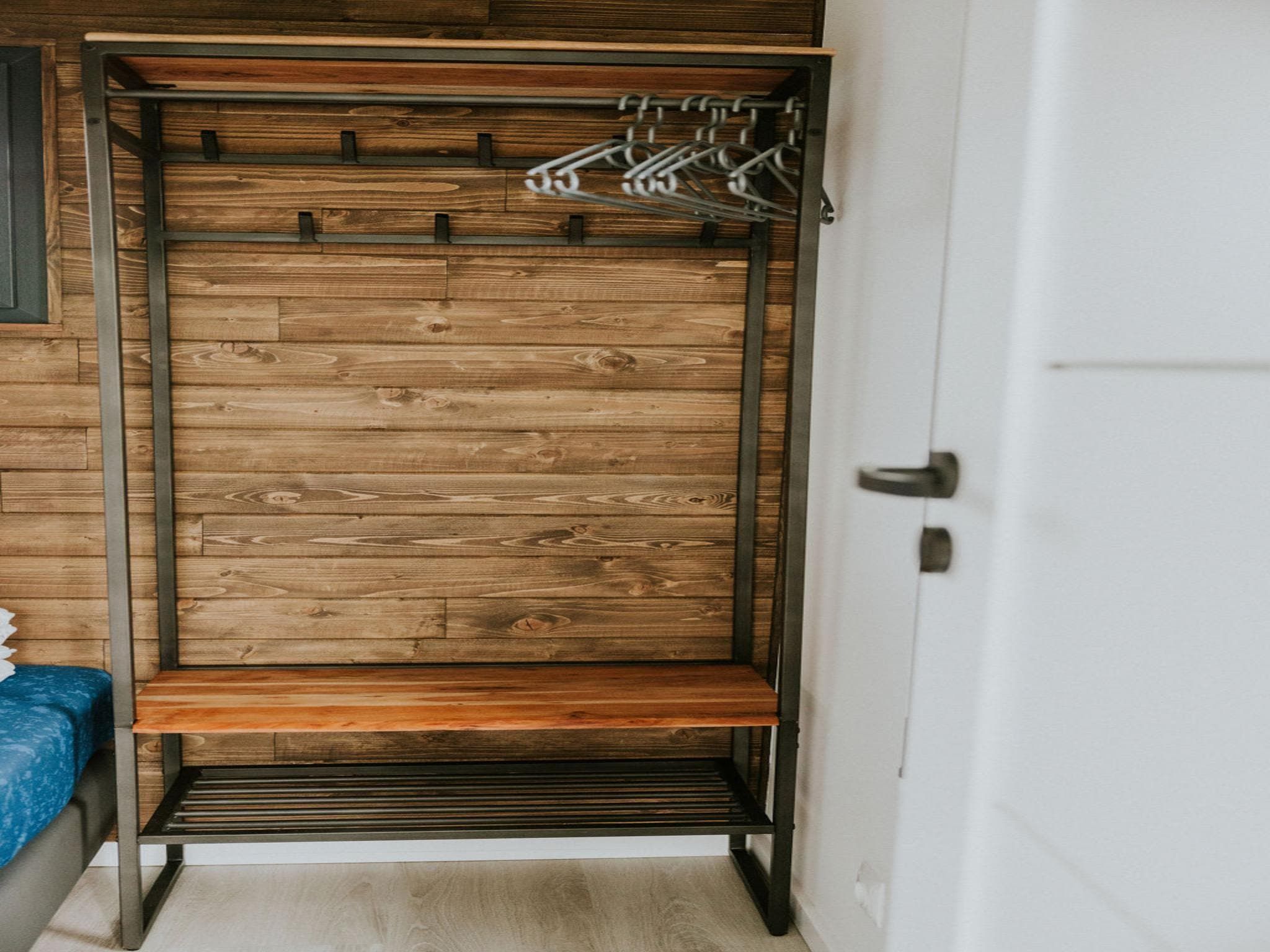 Een slaapkamer van Tiny house XL | 2-4 persoons in Balkbrug