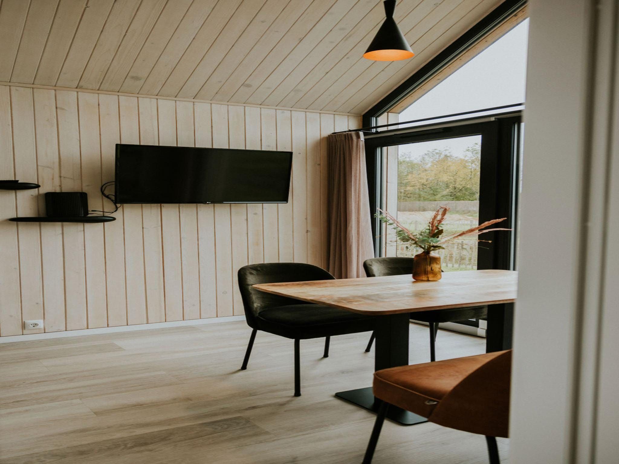De woonkamer van Tiny house XL | 2-4 persoons in Balkbrug