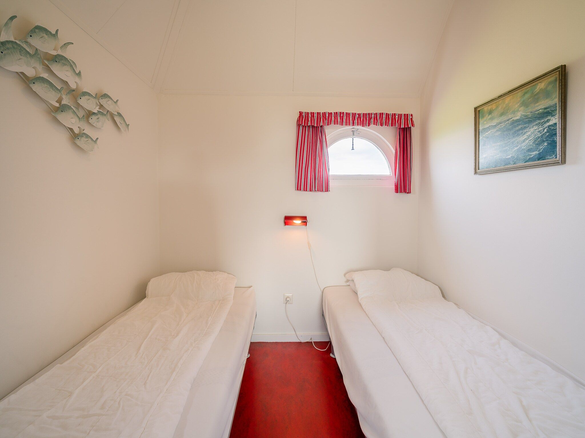 Een slaapkamer van De Boet Waalenburg in De Koog