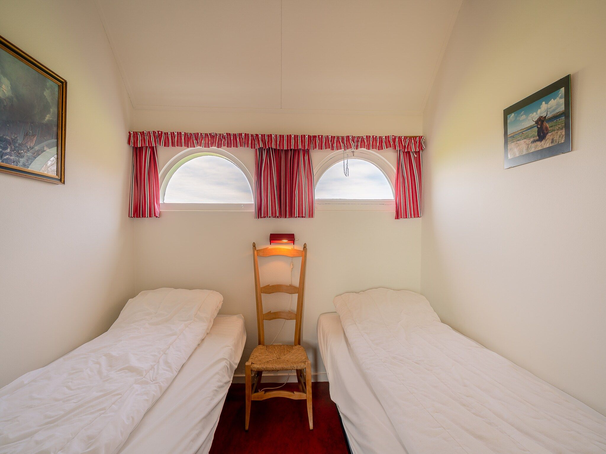 Een slaapkamer van De Boet Waalenburg in De Koog