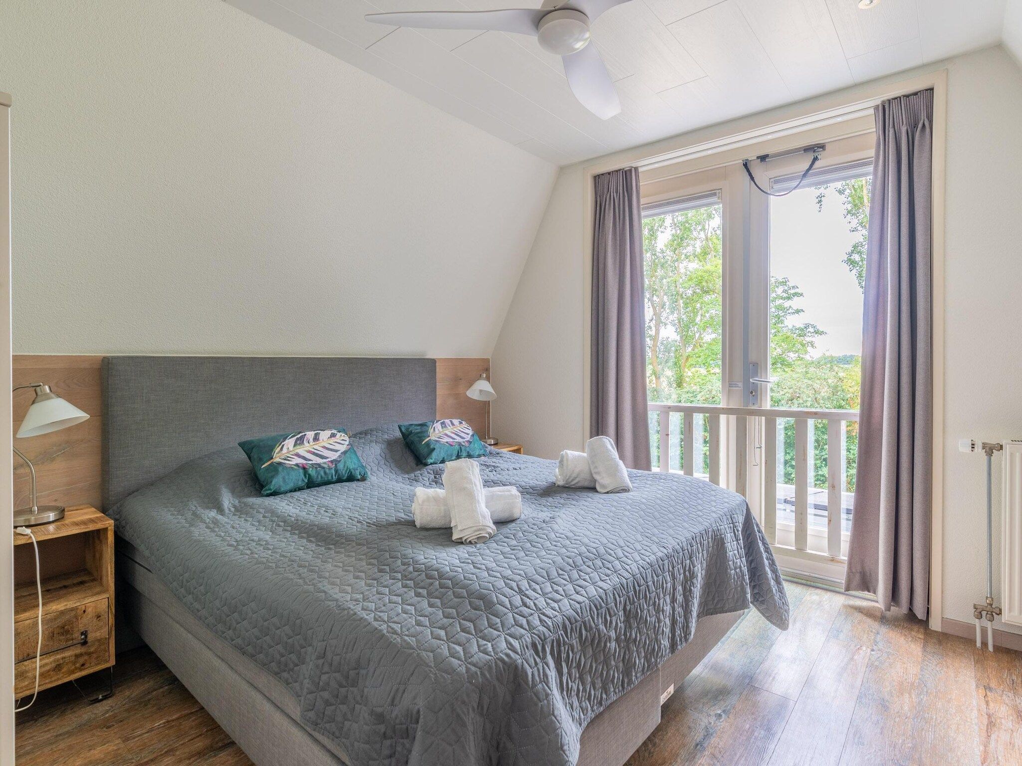 Een slaapkamer van Eb & Vloed in De Koog