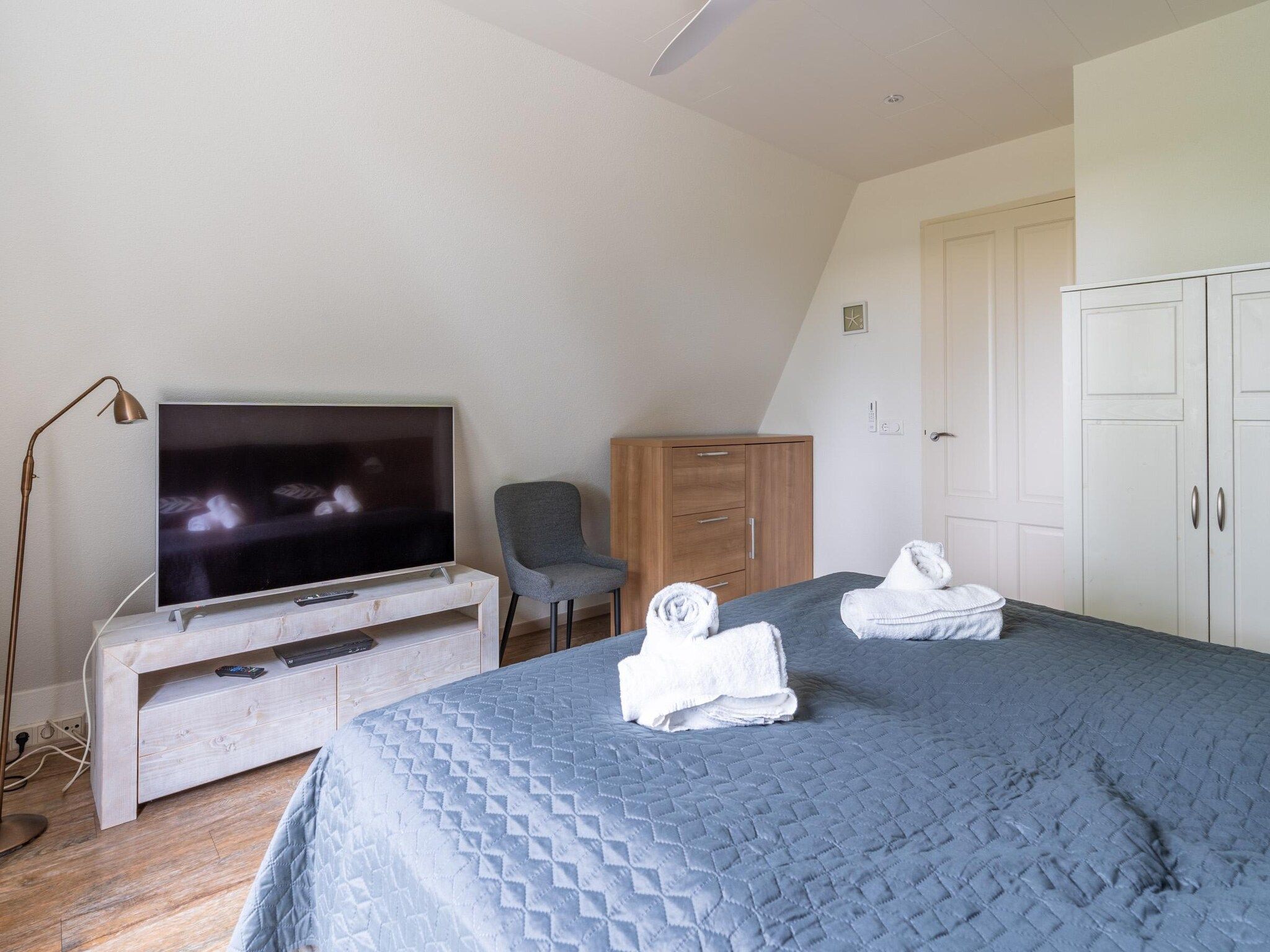 Een slaapkamer van Eb & Vloed in De Koog