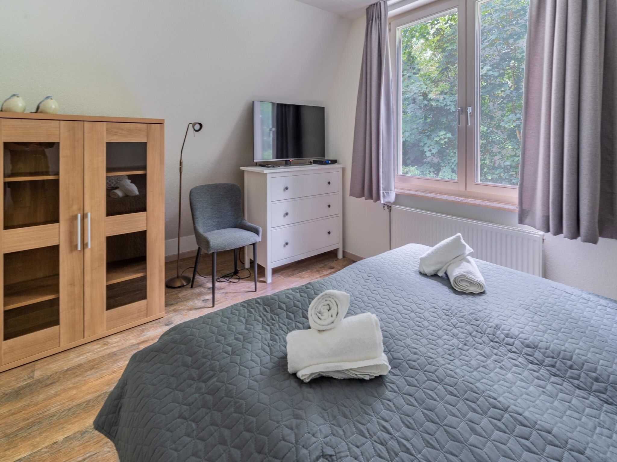 Een slaapkamer van Eb & Vloed in De Koog