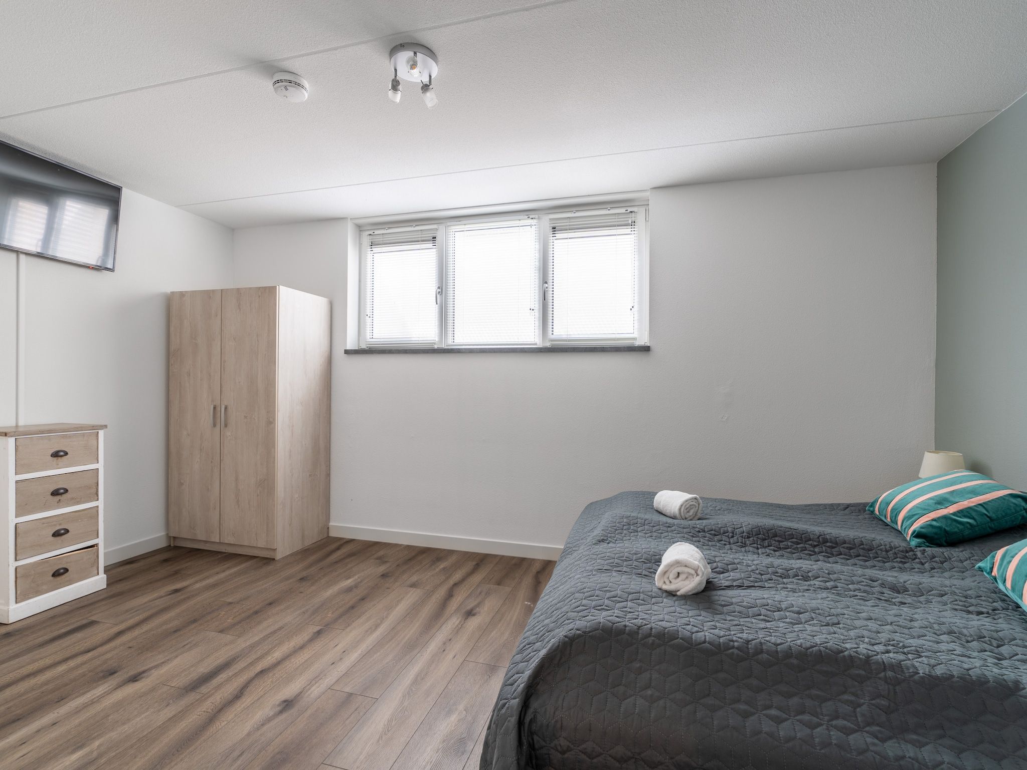 Een slaapkamer van Hoogelandt 106F in De Koog