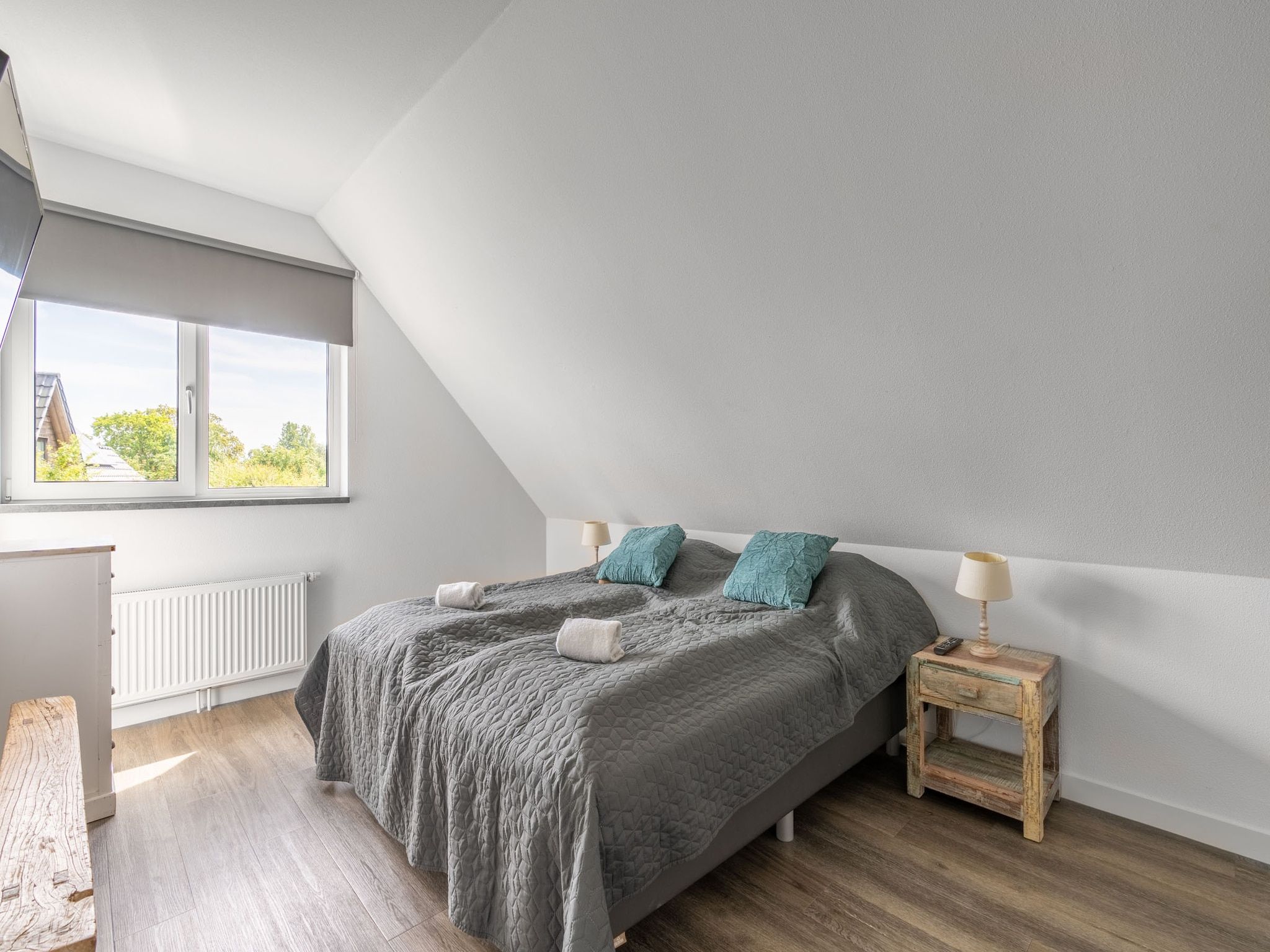 Een slaapkamer van Hoogelandt 106F in De Koog