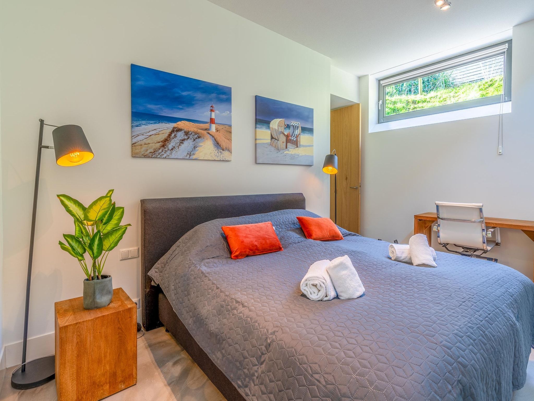 Een slaapkamer van Duynzoom 2 in De Koog