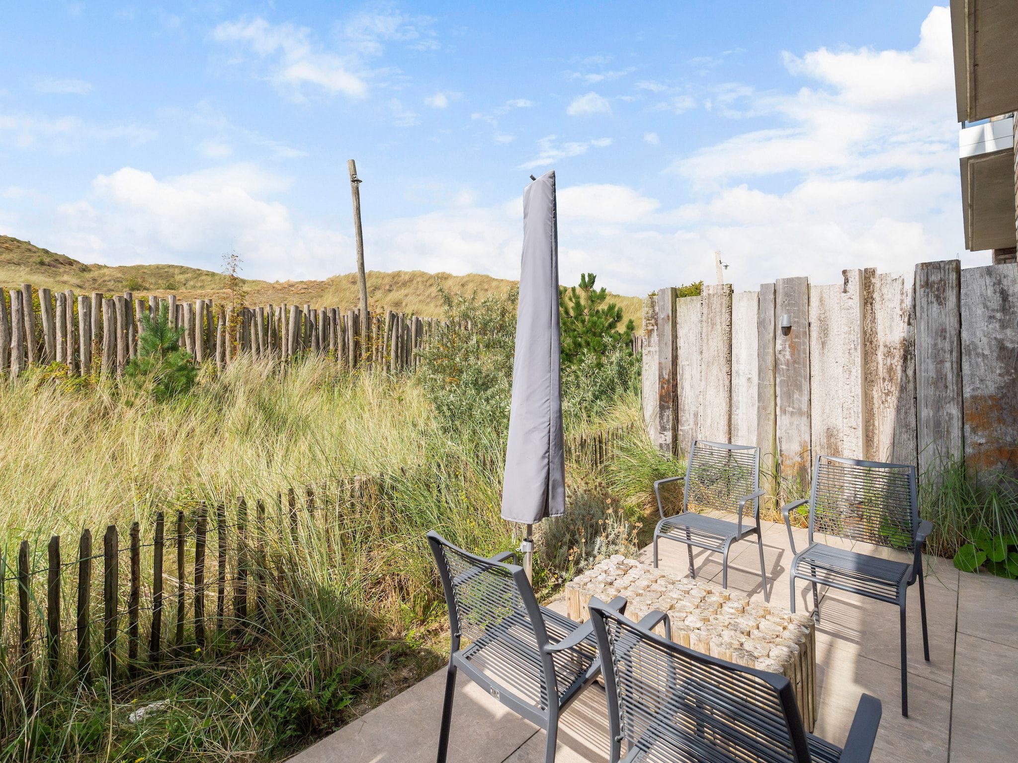 Het terras van Apartment Zand | 4 Persons in Sint Maartenszee