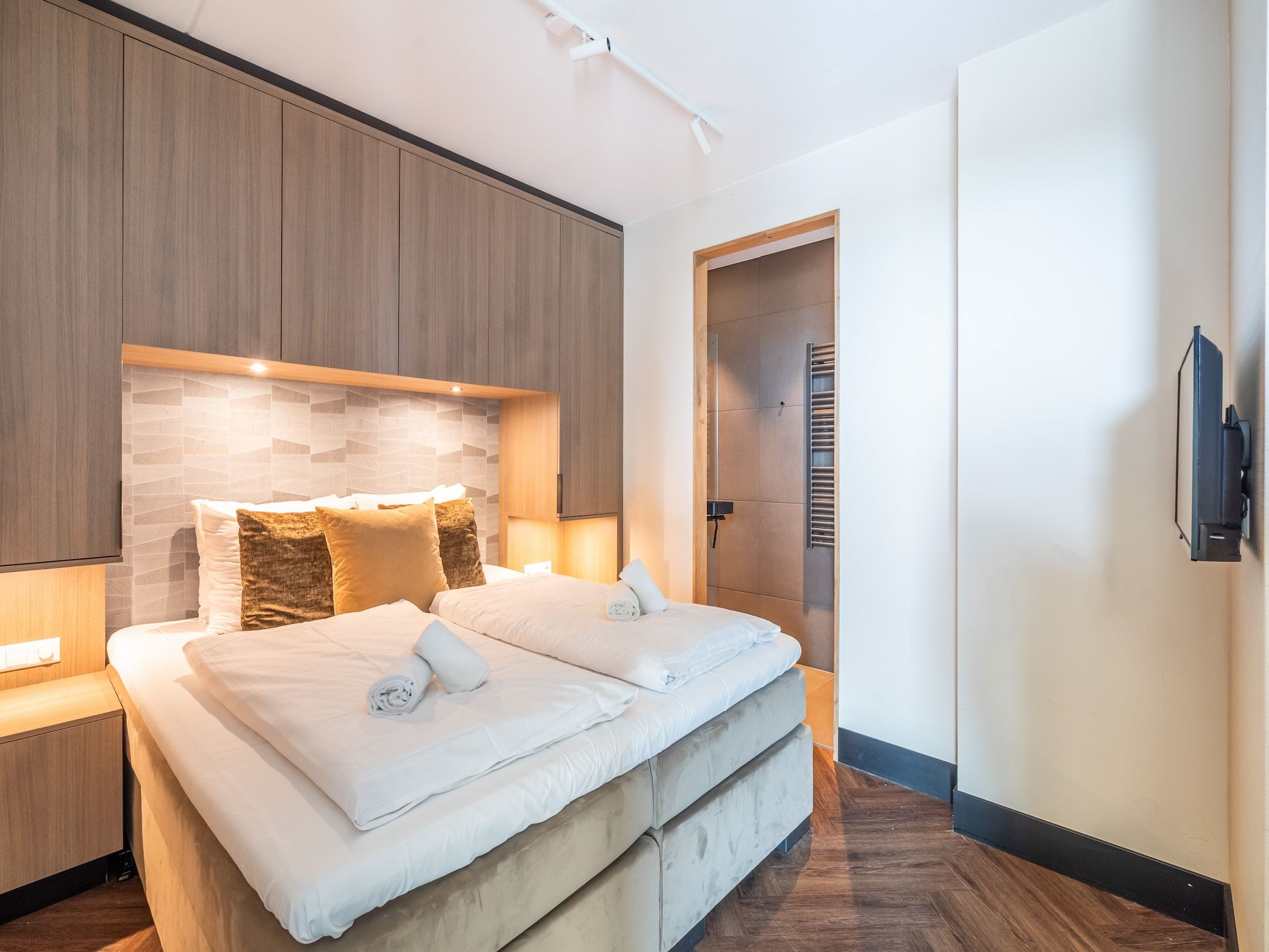 Een slaapkamer van Penthouse Zilt | 6 Persons in Sint Maartenszee