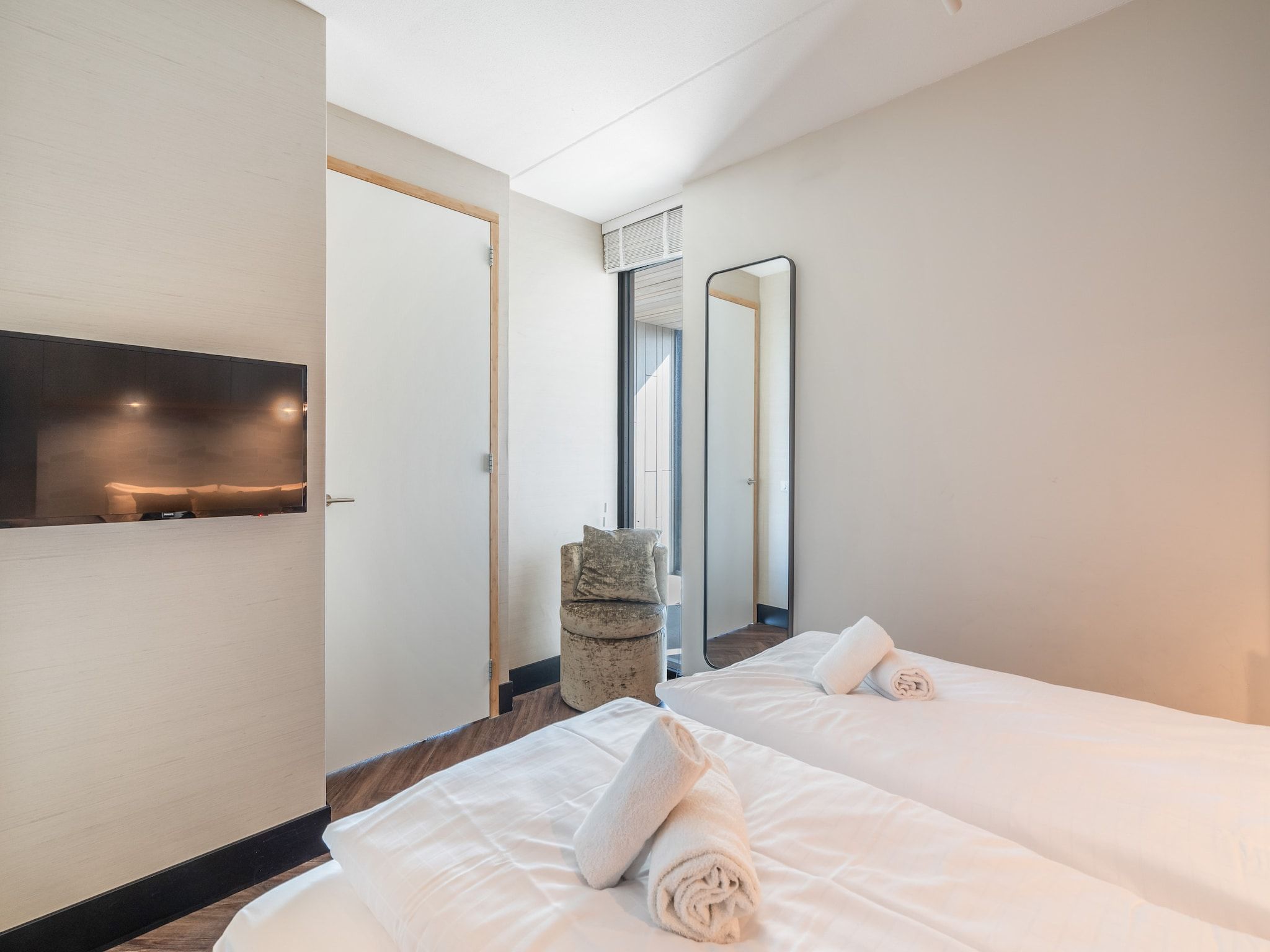 Een slaapkamer van Penthouse Zilt | 6 Persons in Sint Maartenszee