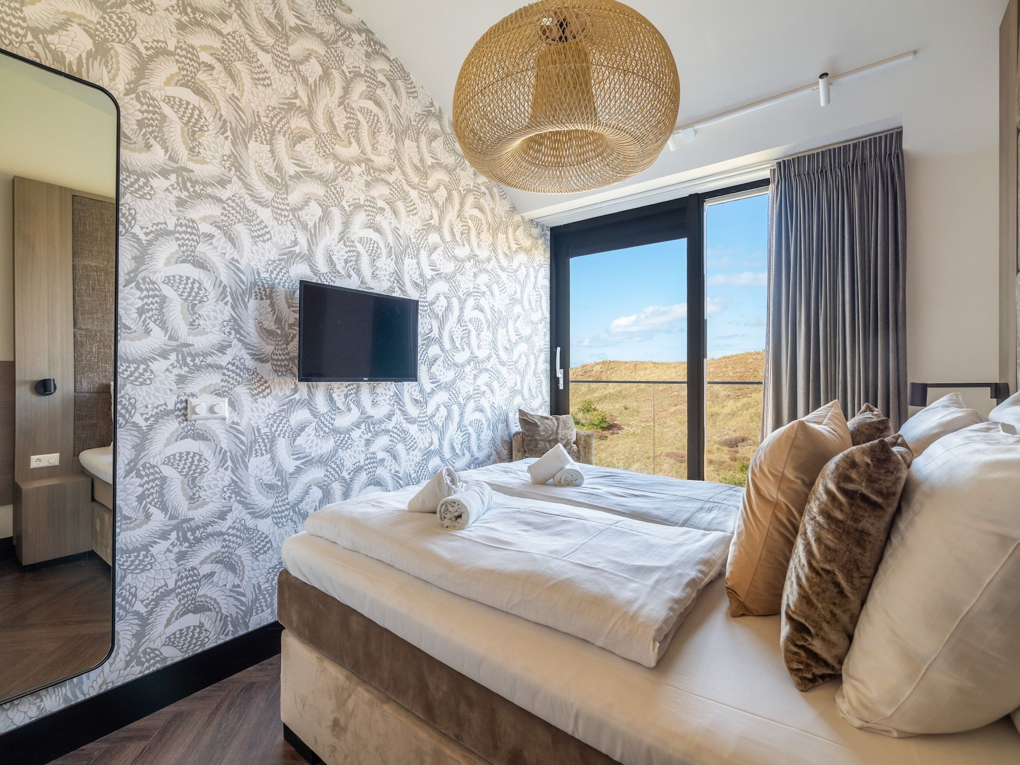 Een slaapkamer van Penthouse Zilt | 6 Persons in Sint Maartenszee