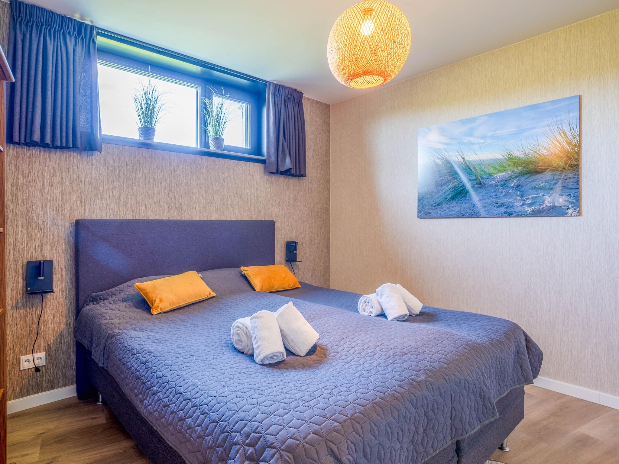 Een slaapkamer van Waalburght 24 in De Waal