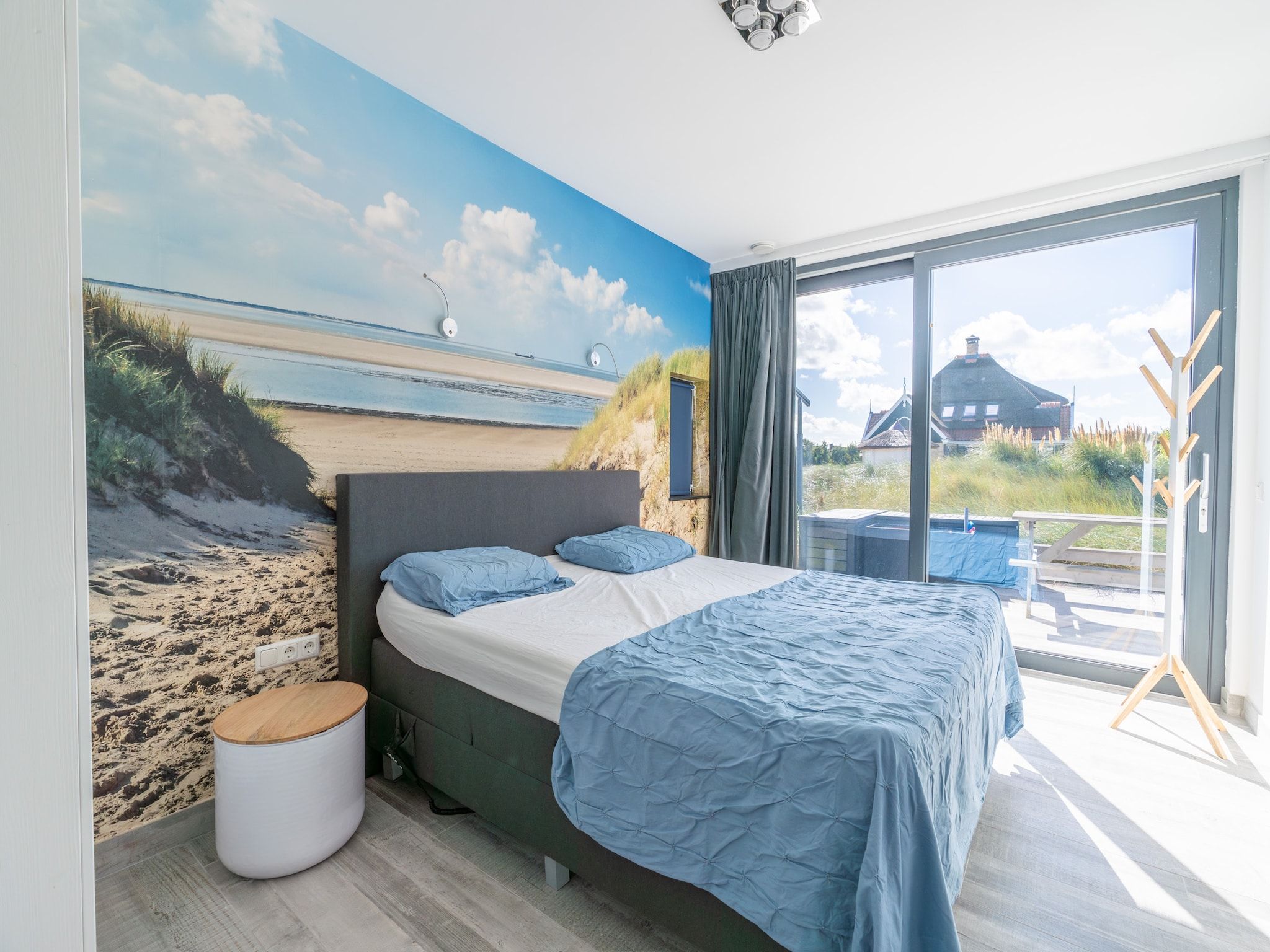 Een slaapkamer van Strandvilla Hygge in Den Burg