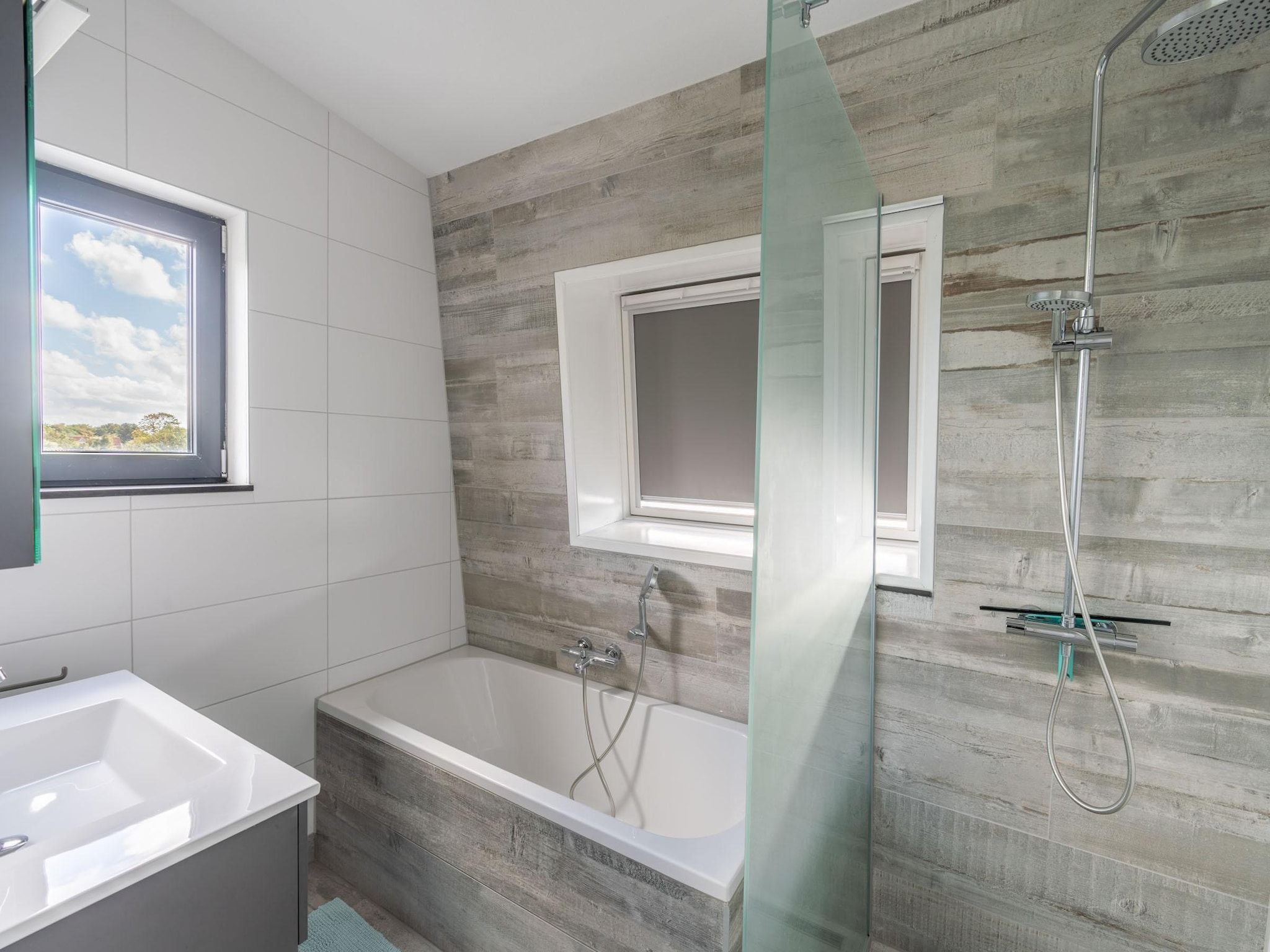 De badkamer van Strandvilla Hygge in Den Burg