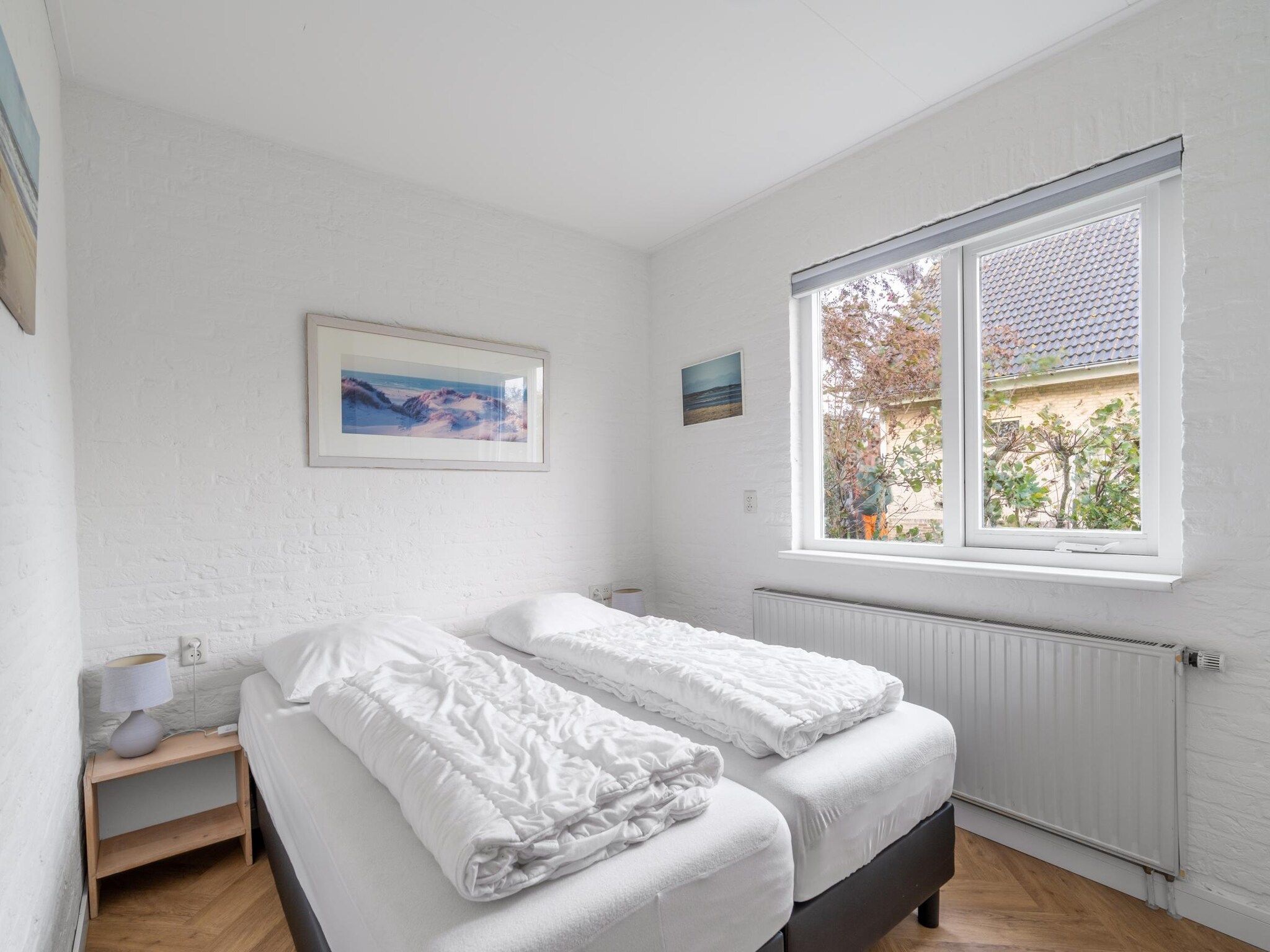 Een slaapkamer van Stappeland 197 in De Koog