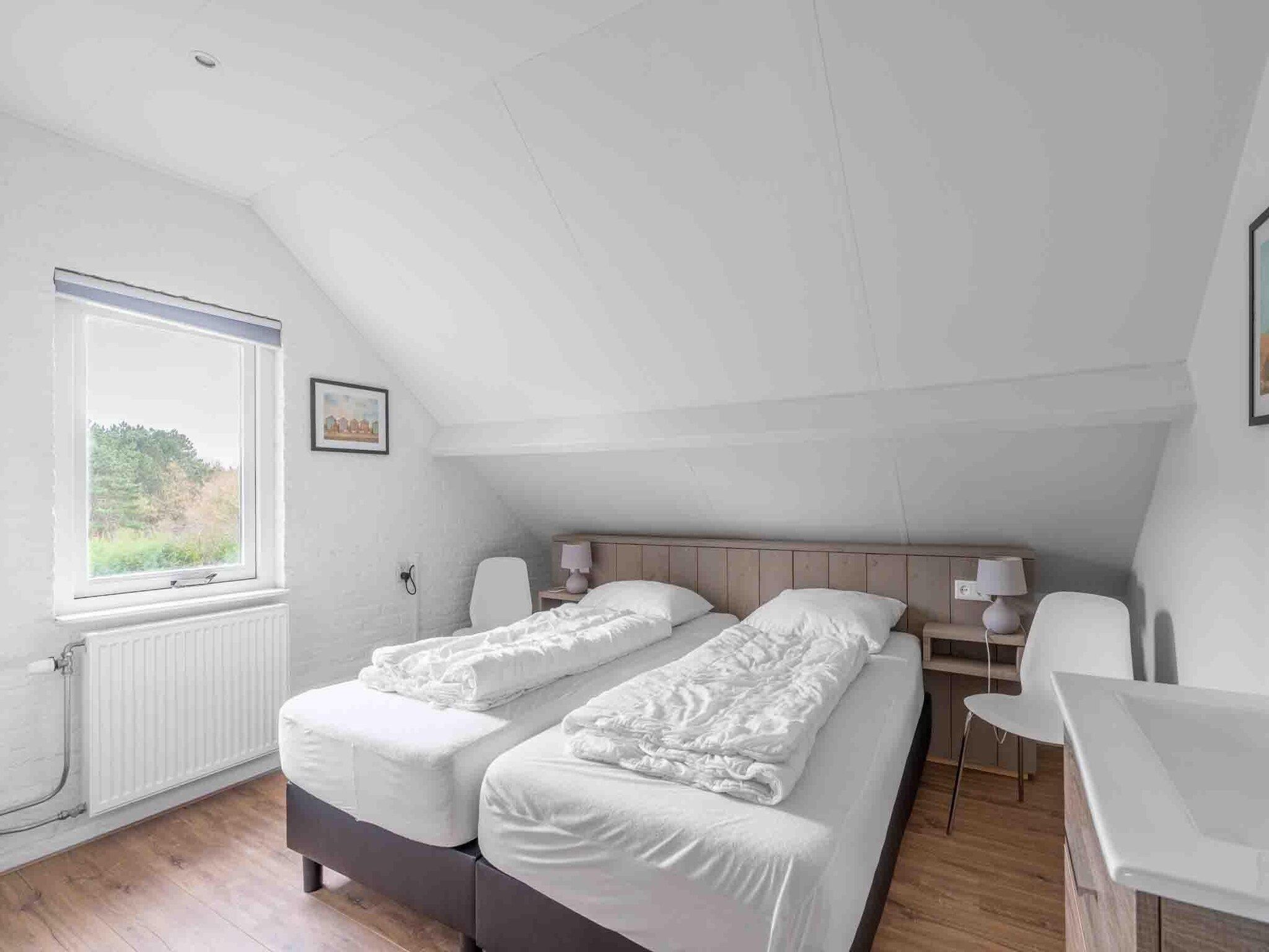 Een slaapkamer van Stappeland 197 in De Koog