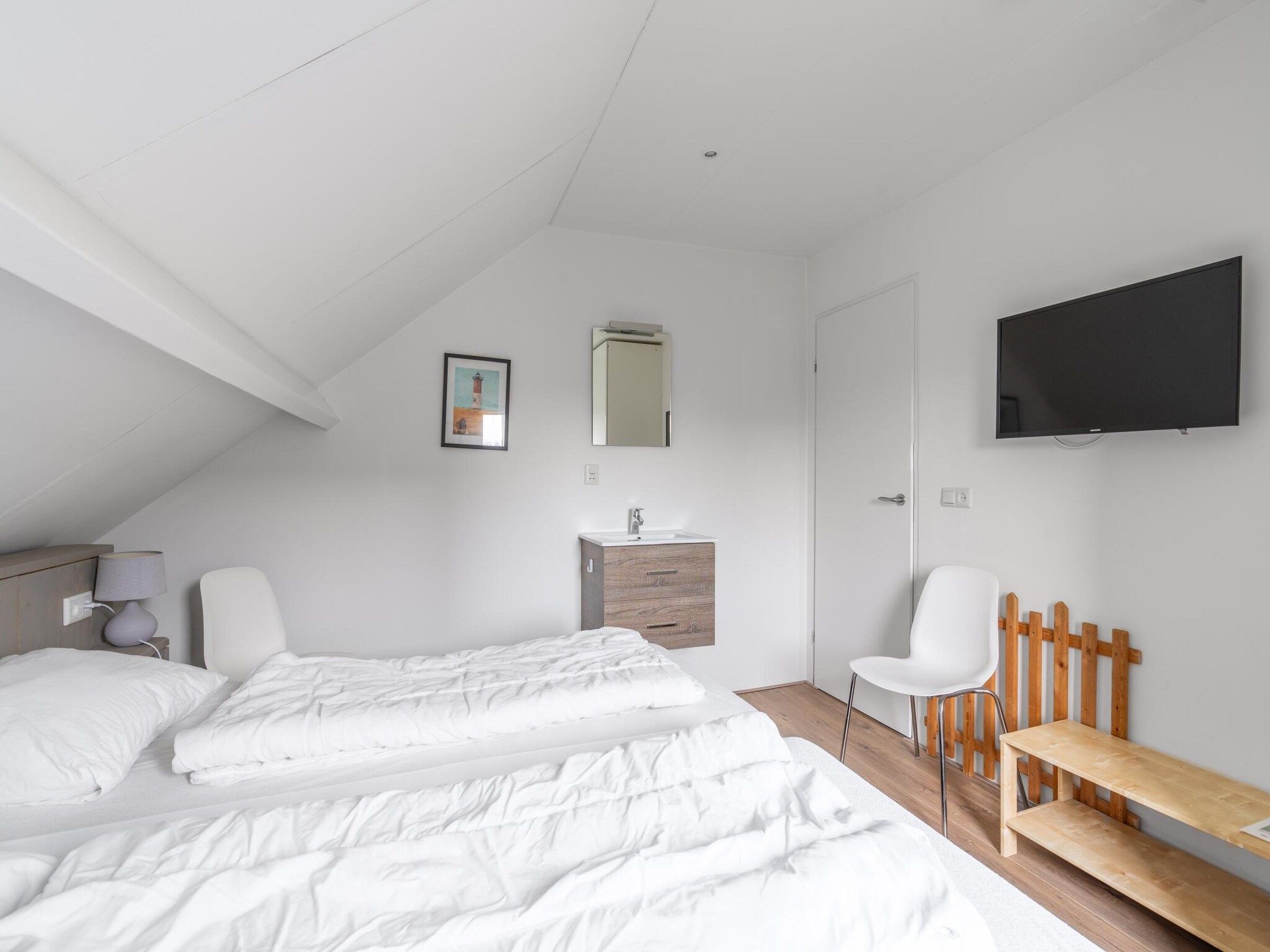 Een slaapkamer van Stappeland 197 in De Koog