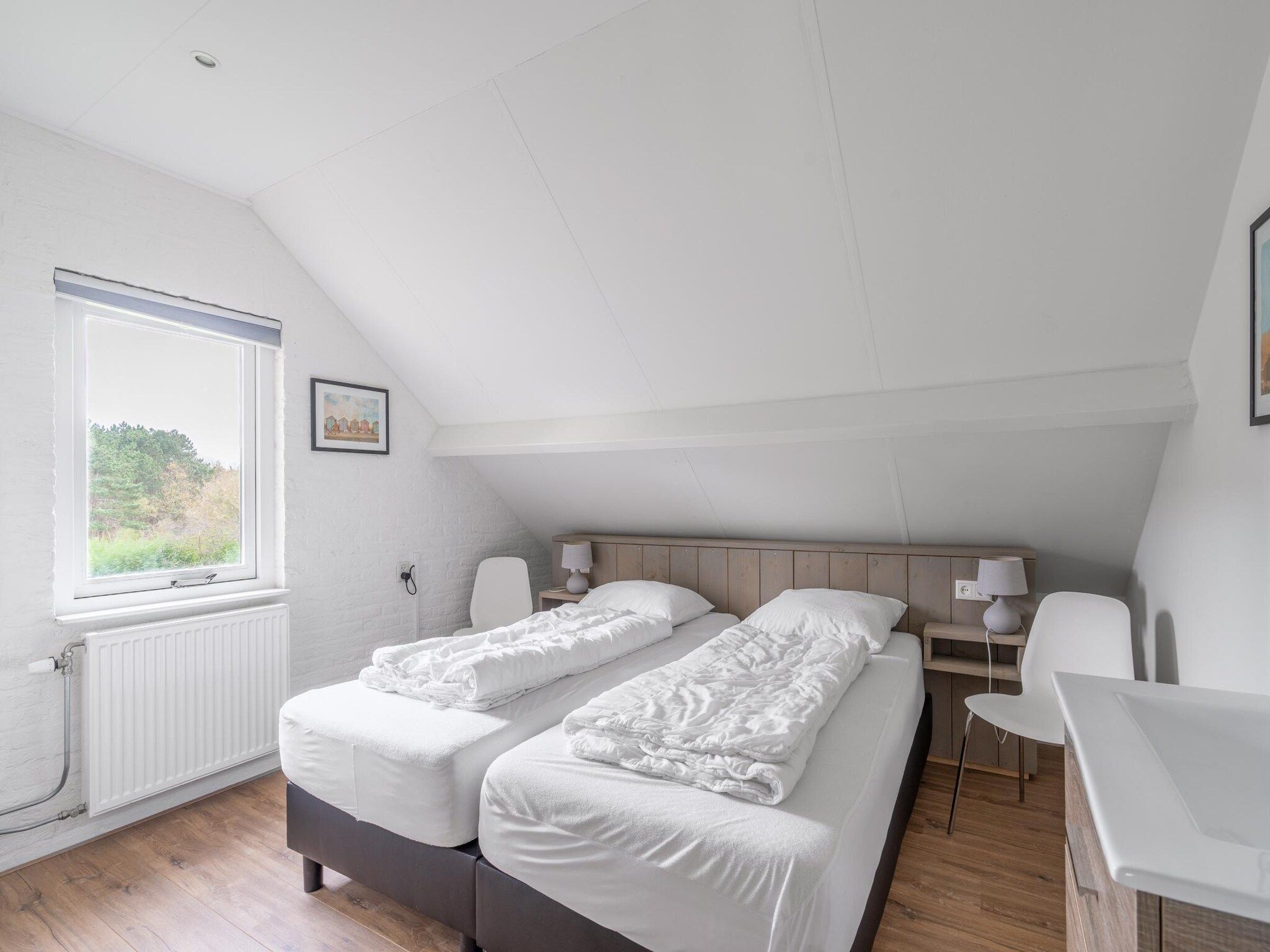 Een slaapkamer van Stappeland 197 in De Koog