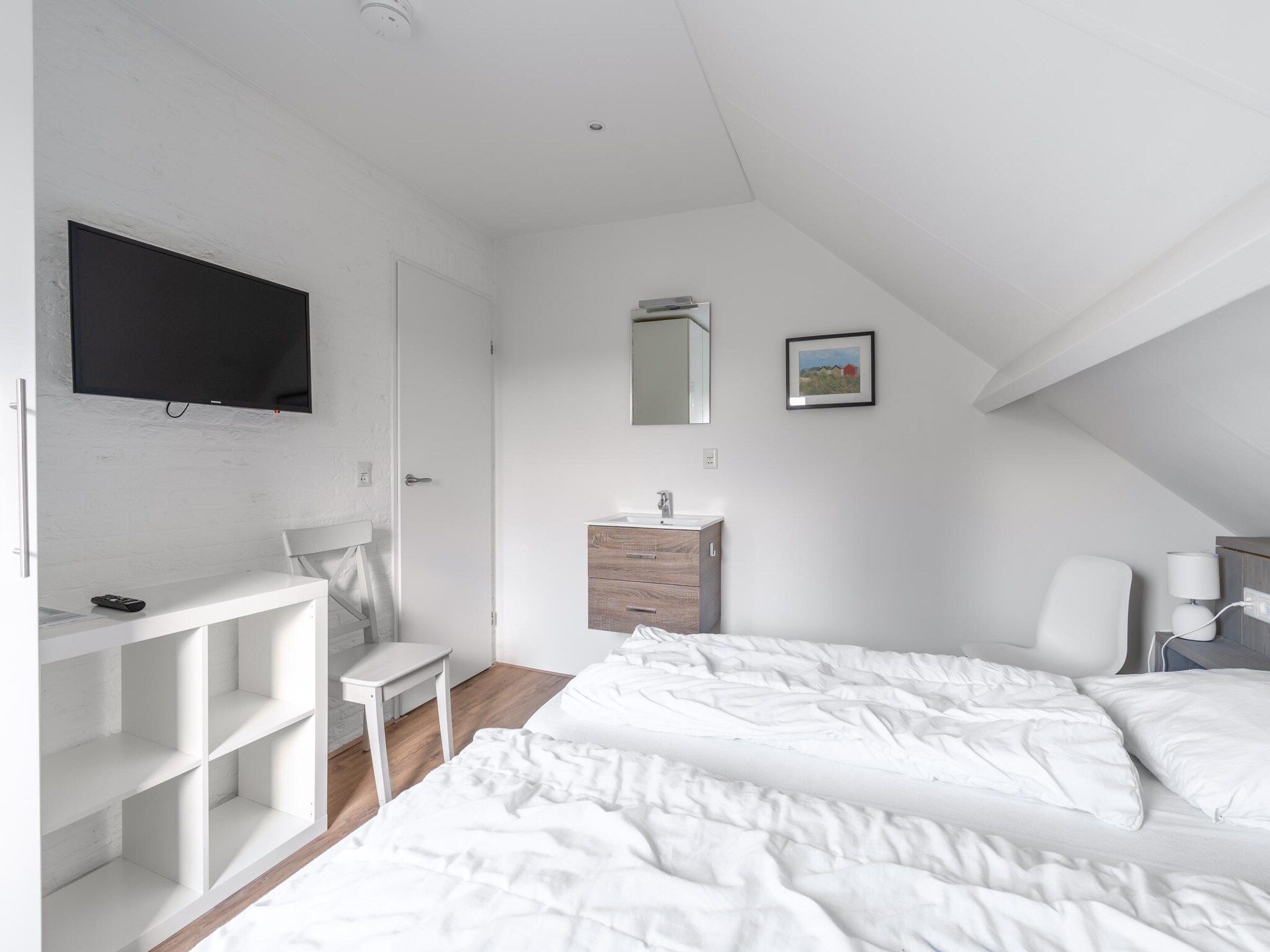 Een slaapkamer van Stappeland 197 in De Koog