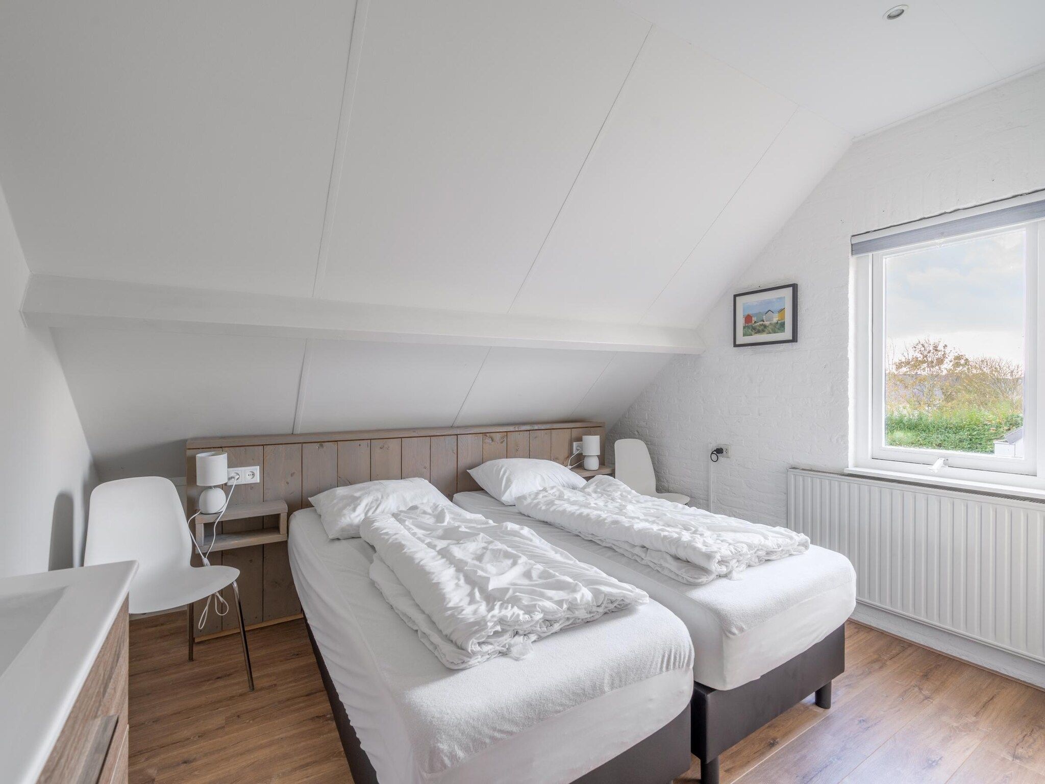 Een slaapkamer van Stappeland 197 in De Koog