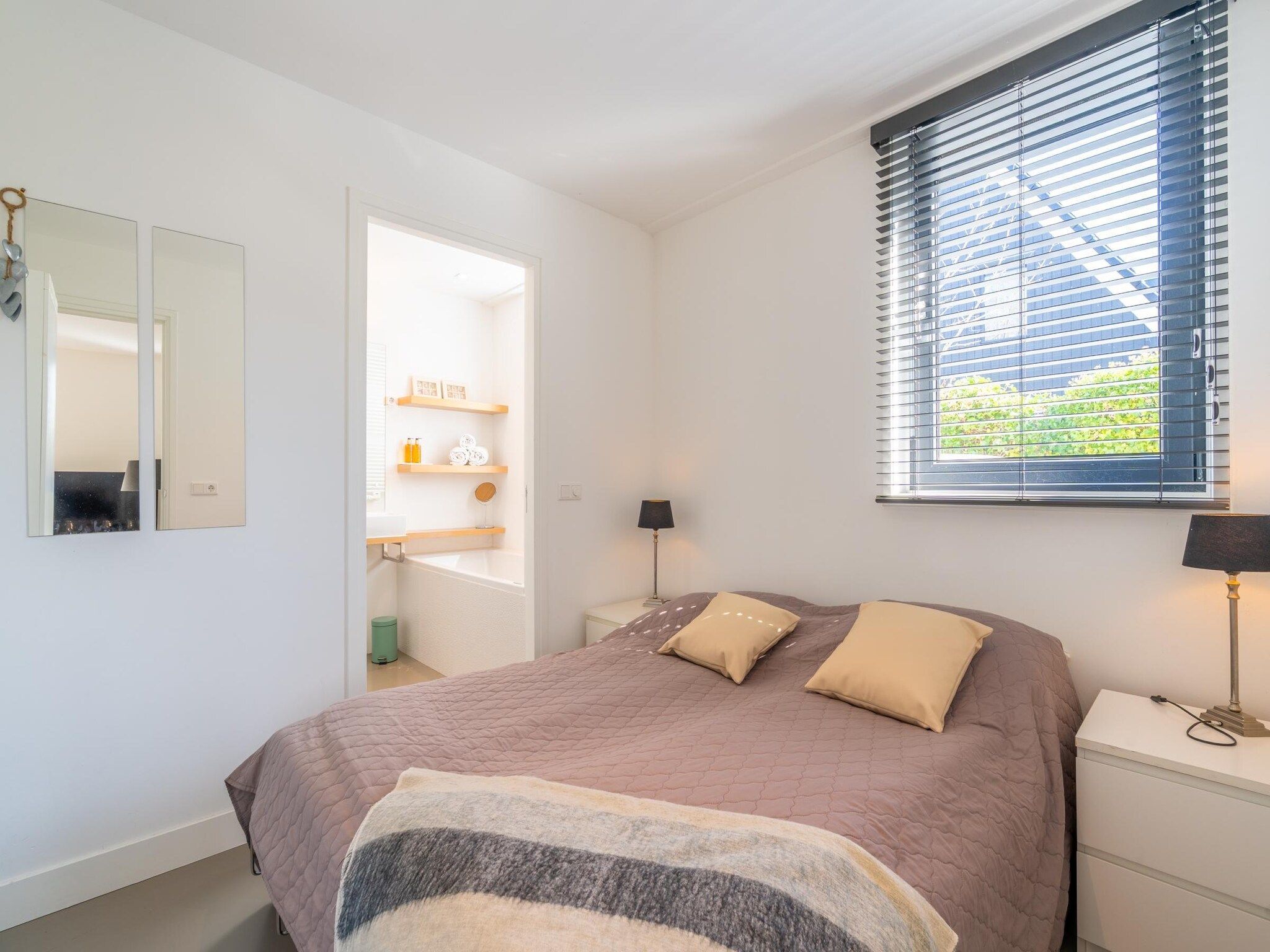 Een slaapkamer van De Wadden Parel 184 in Den Burg