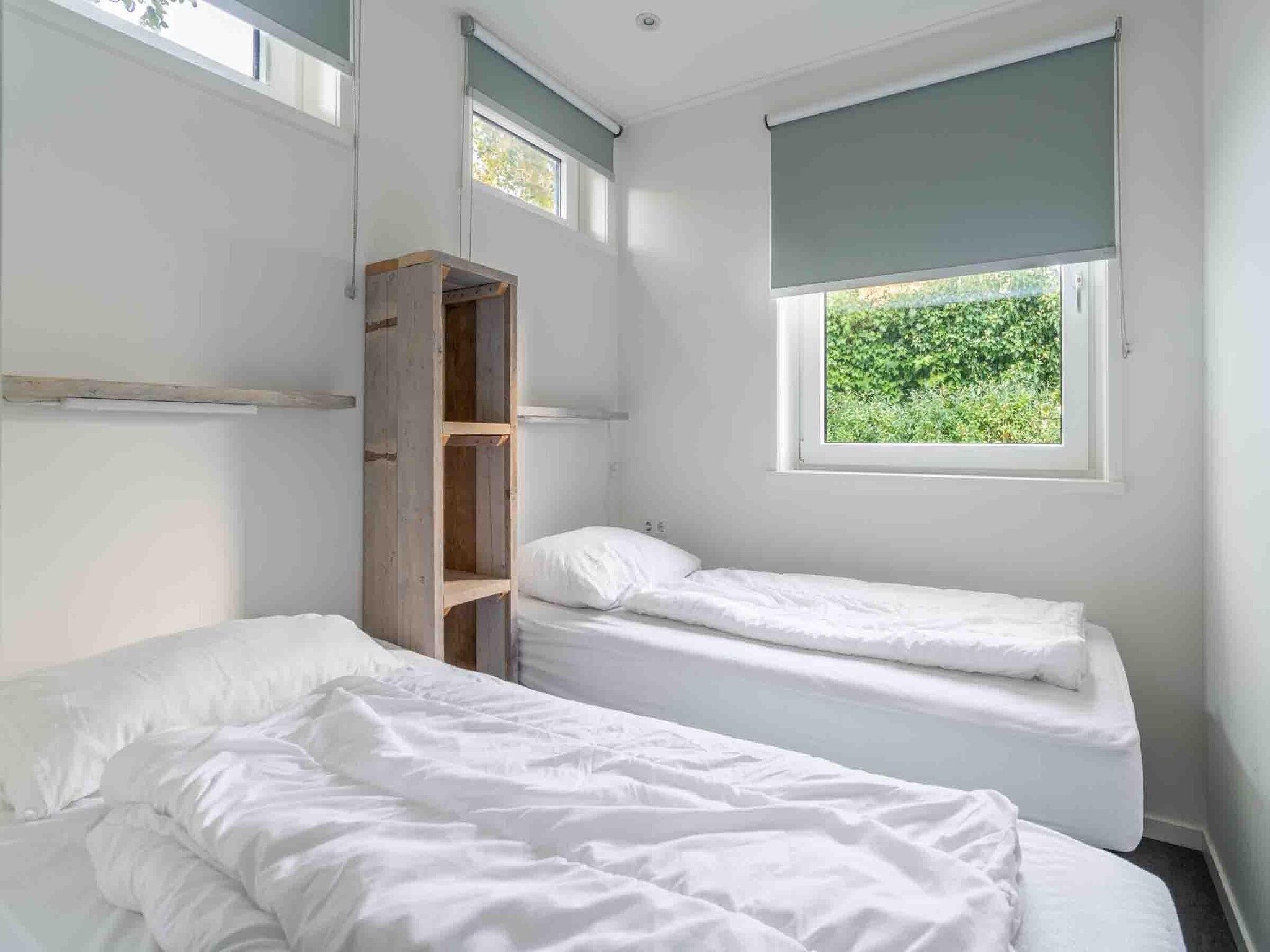 Een slaapkamer van Epelaan 34 in De Koog