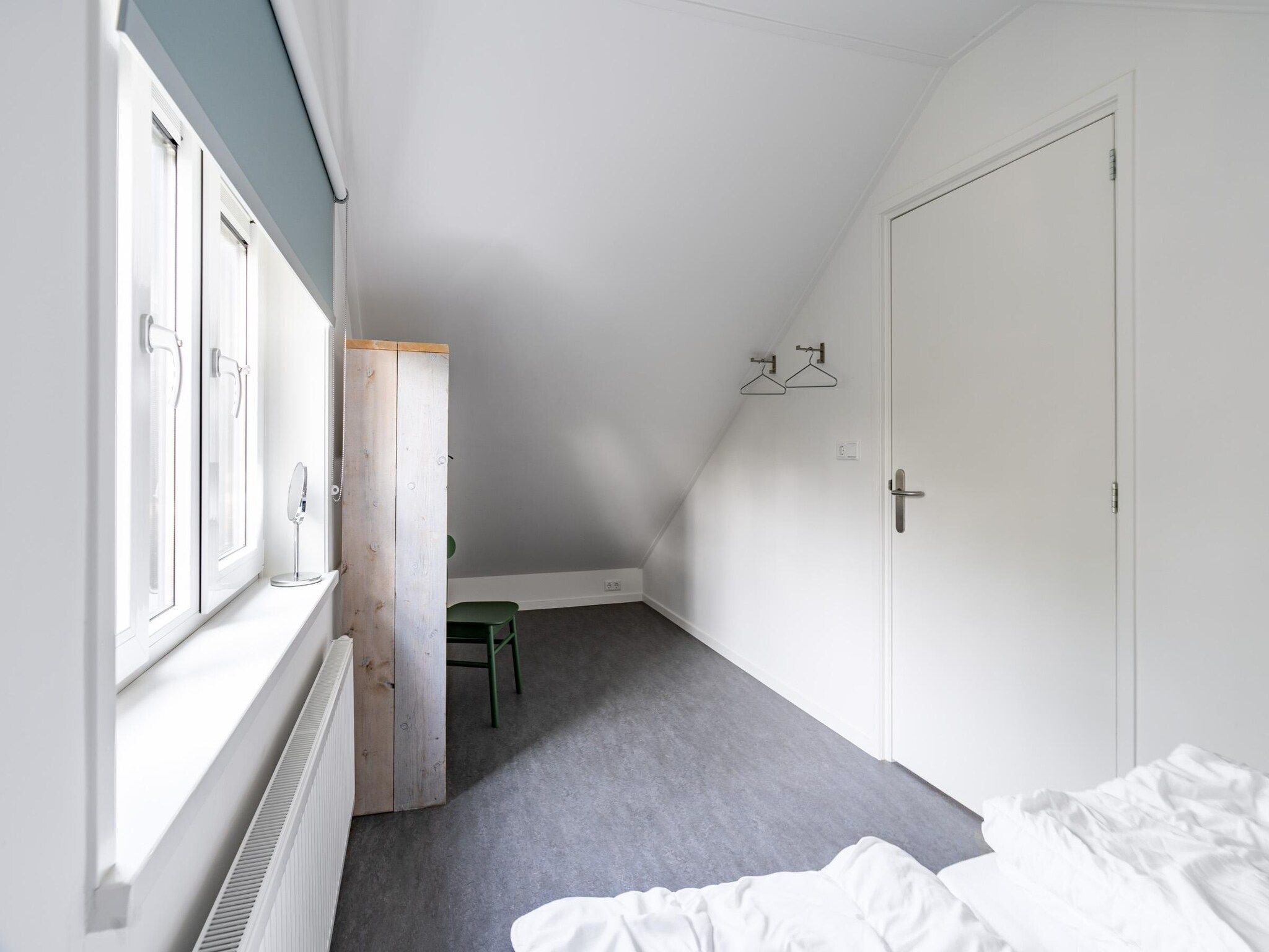 Een slaapkamer van Epelaan 34 in De Koog