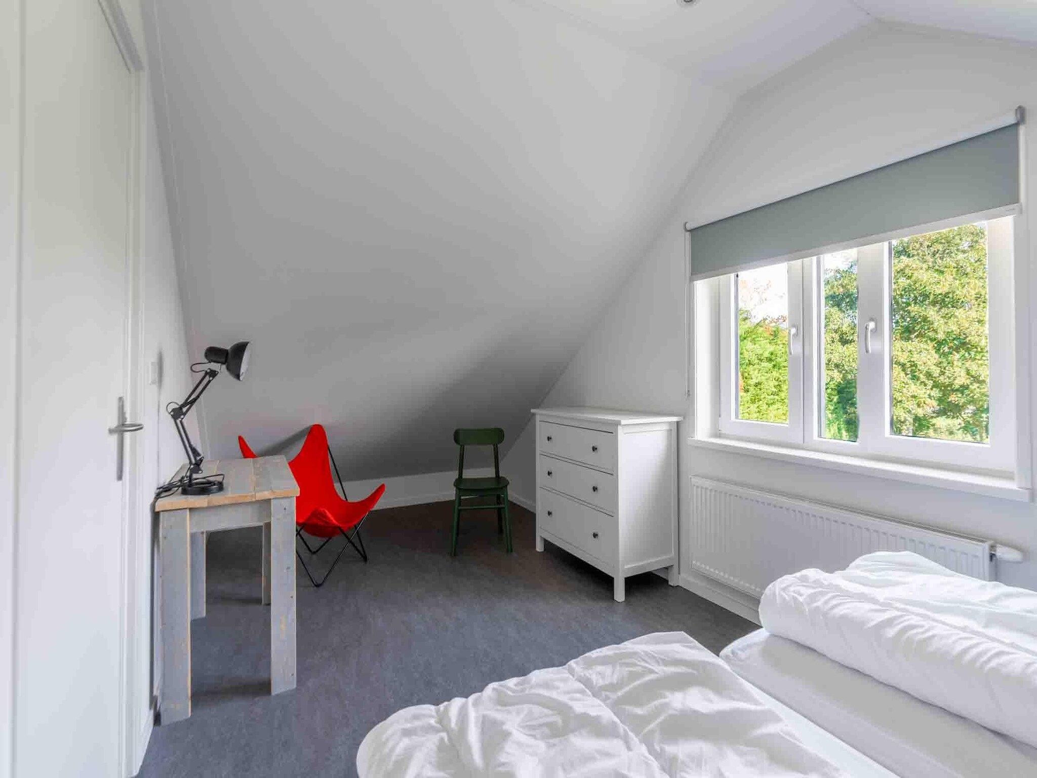 Een slaapkamer van Epelaan 34 in De Koog