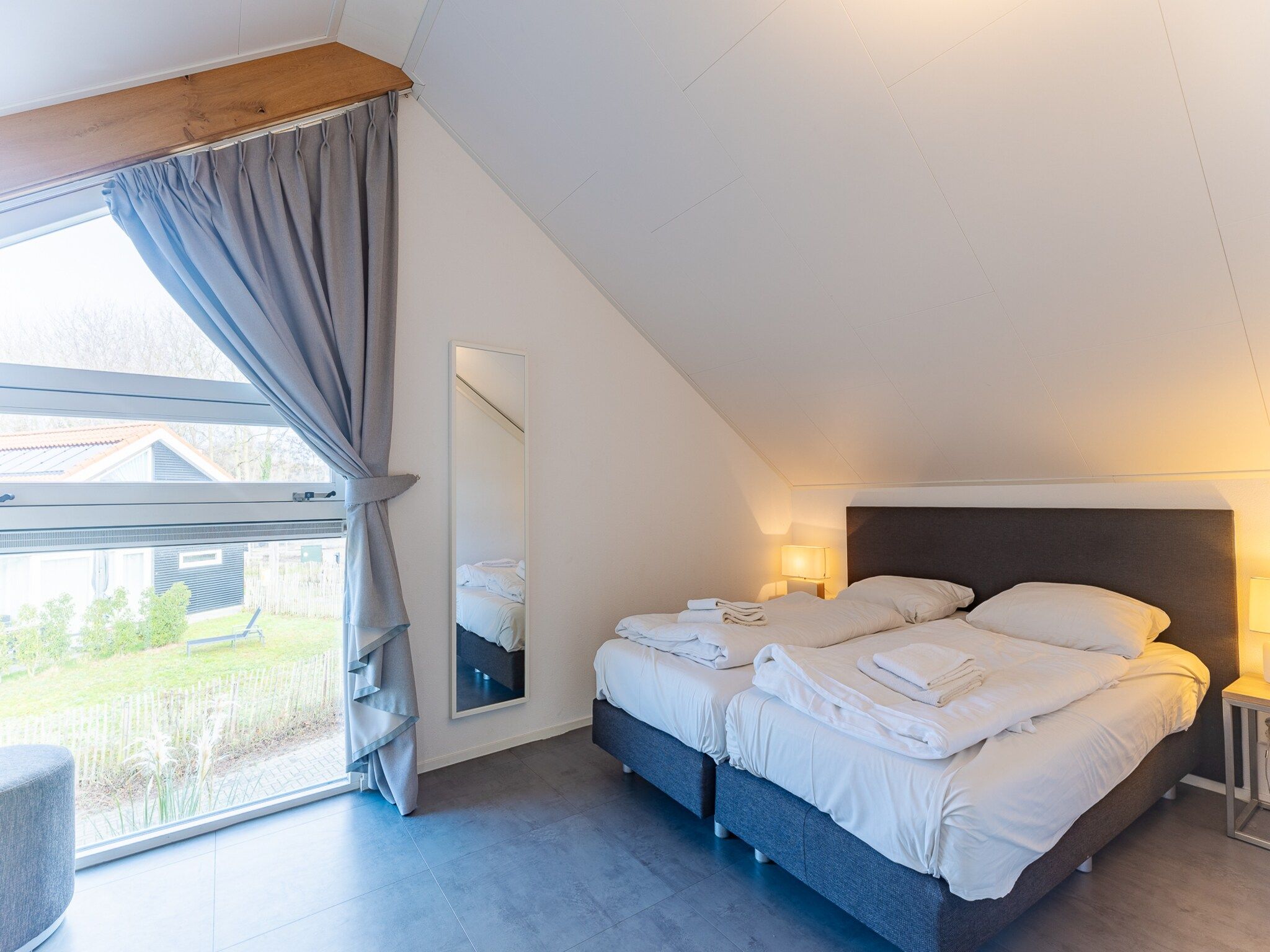 Een slaapkamer van Zonnedorp 7 De Meerpaal in Renesse | Comfortable holiday house close to the beach in Renesse