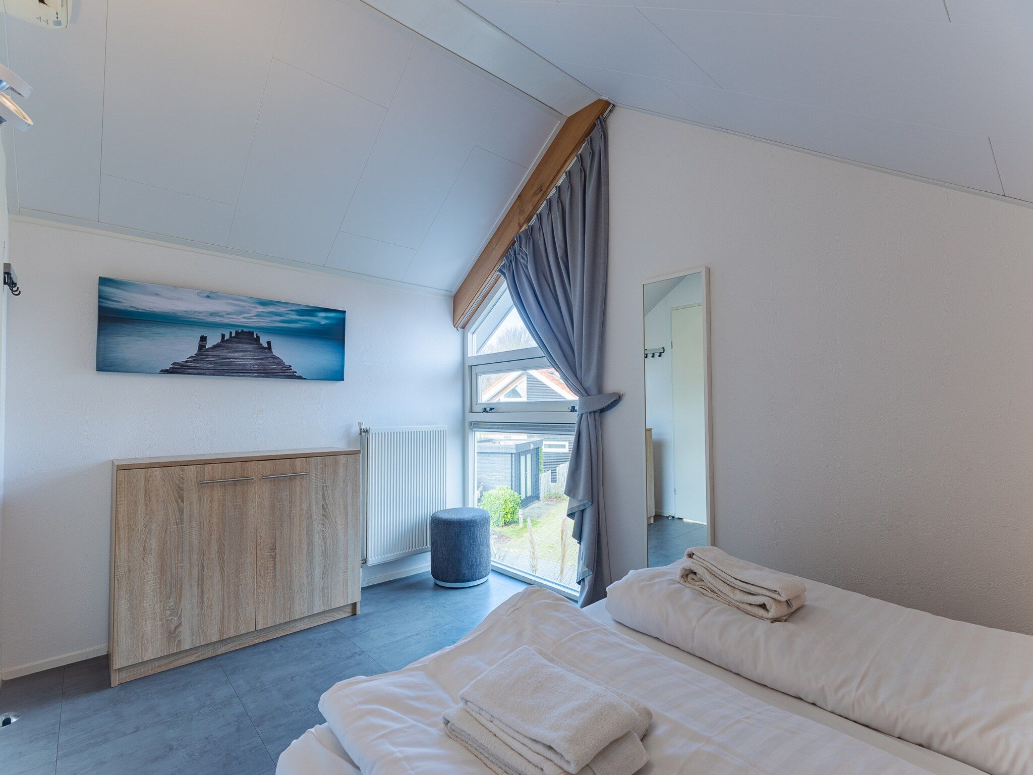 Een slaapkamer van Zonnedorp 7 De Meerpaal in Renesse | Comfortable holiday house close to the beach in Renesse