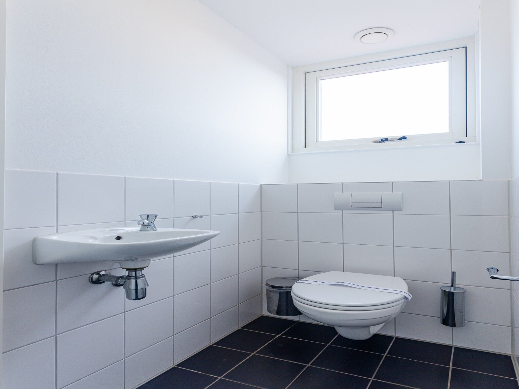 De badkamer van Zonnedorp 19 Modern holiday home Renesse | Beach within walking distance in Renesse