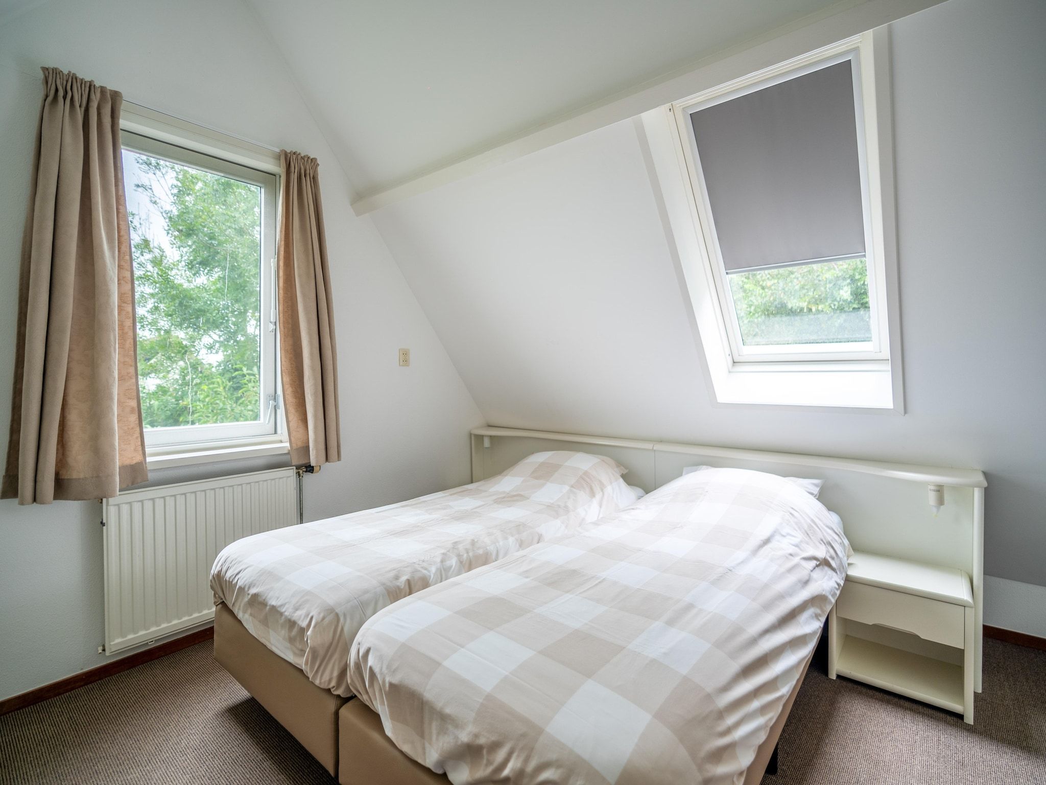 Een slaapkamer van Nieuwlanderweg 51 in De Waal