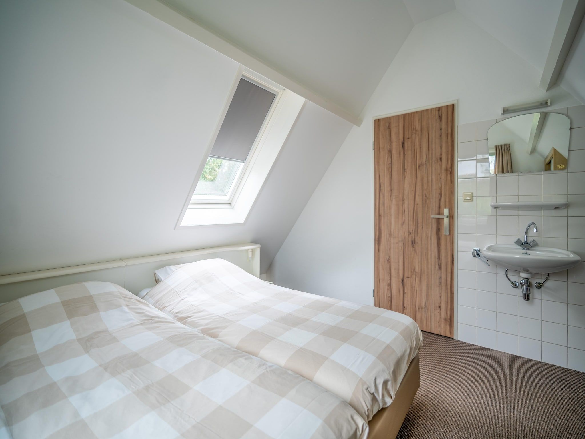 Een slaapkamer van Nieuwlanderweg 51 in De Waal