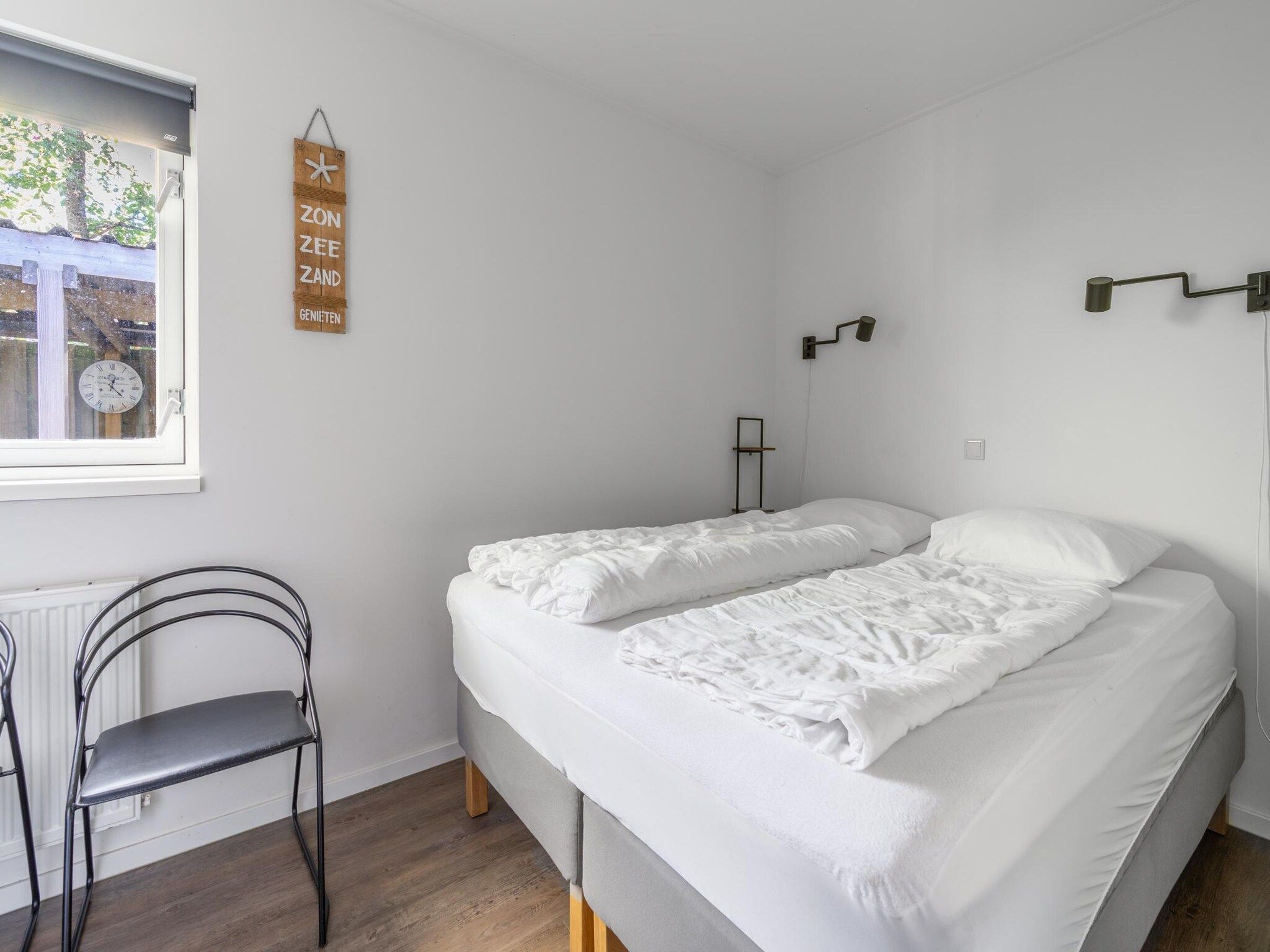 Een slaapkamer van Pelikaanweg 21 in De Koog