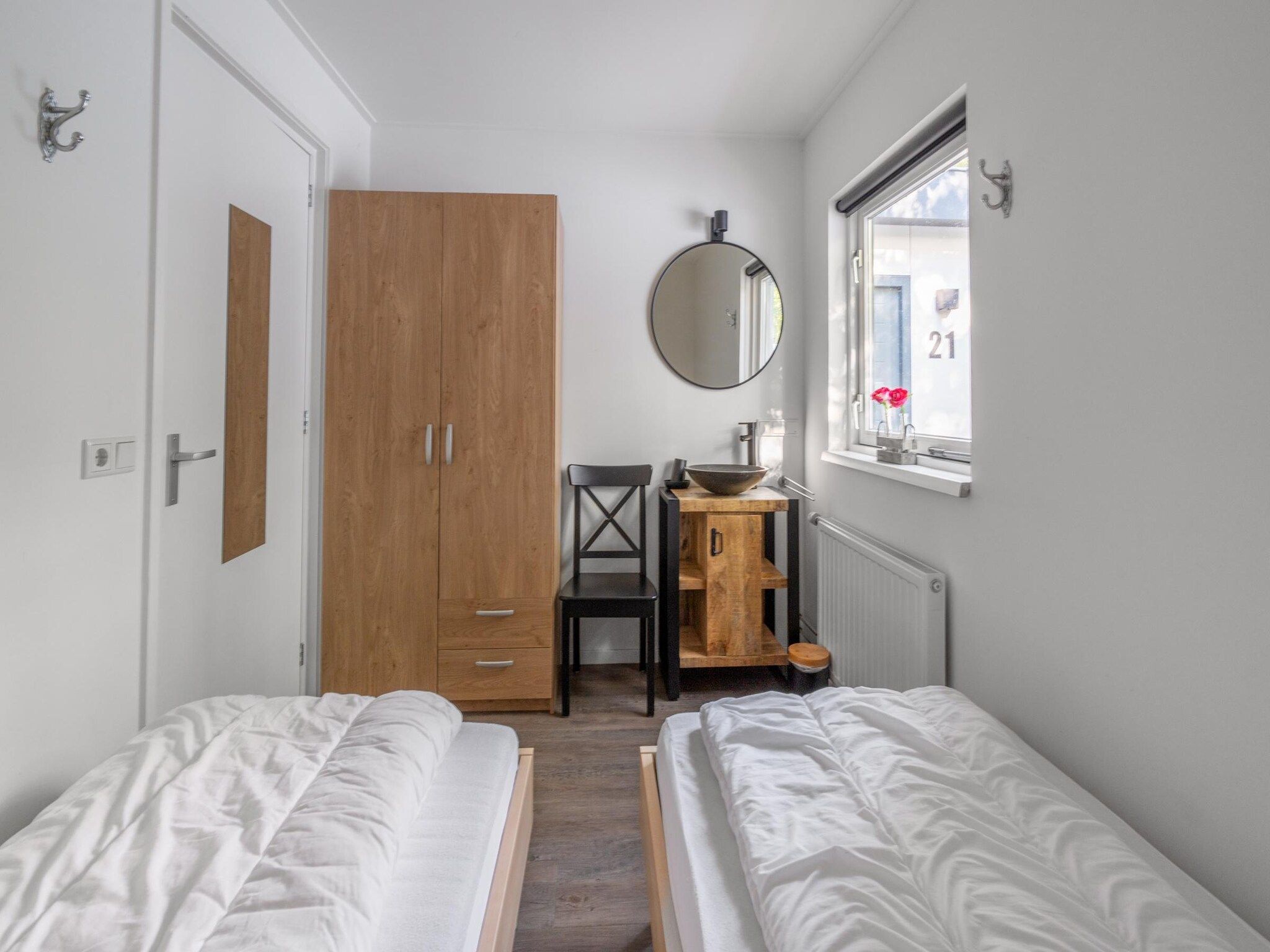 Een slaapkamer van Pelikaanweg 21 in De Koog